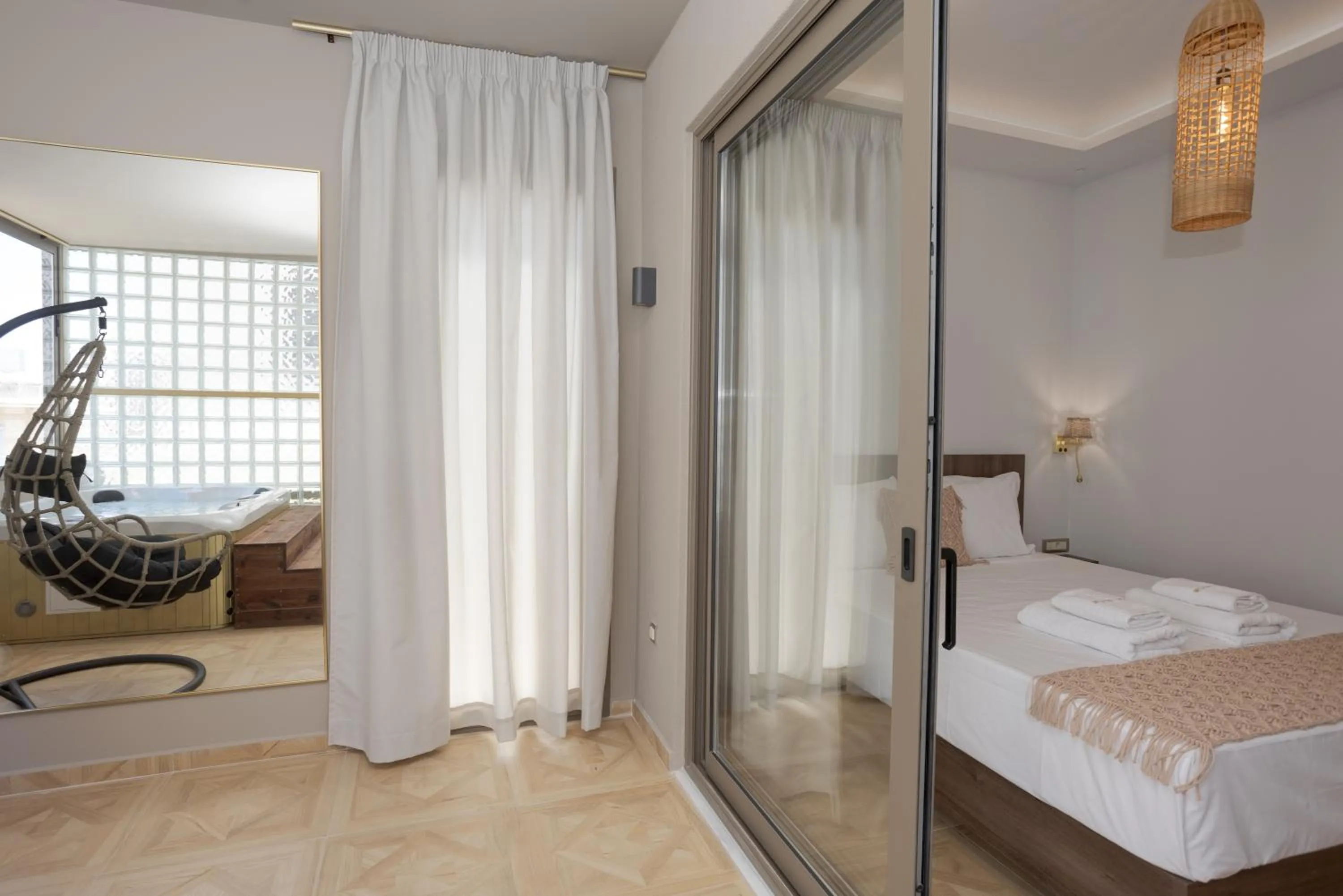 Bed in Royal Gold City Suites by Omilos Hotels