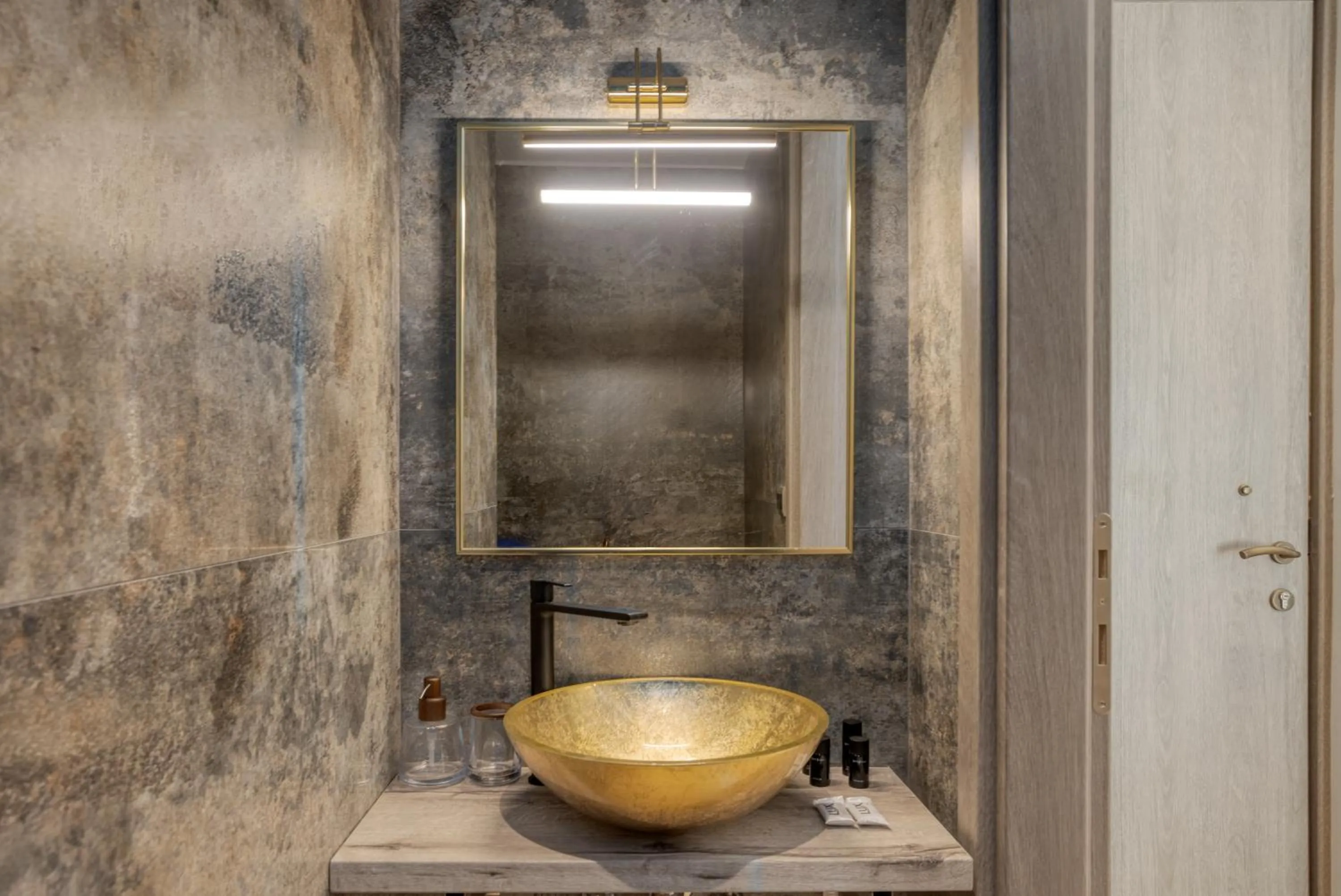 Shower in Royal Gold City Suites by Omilos Hotels