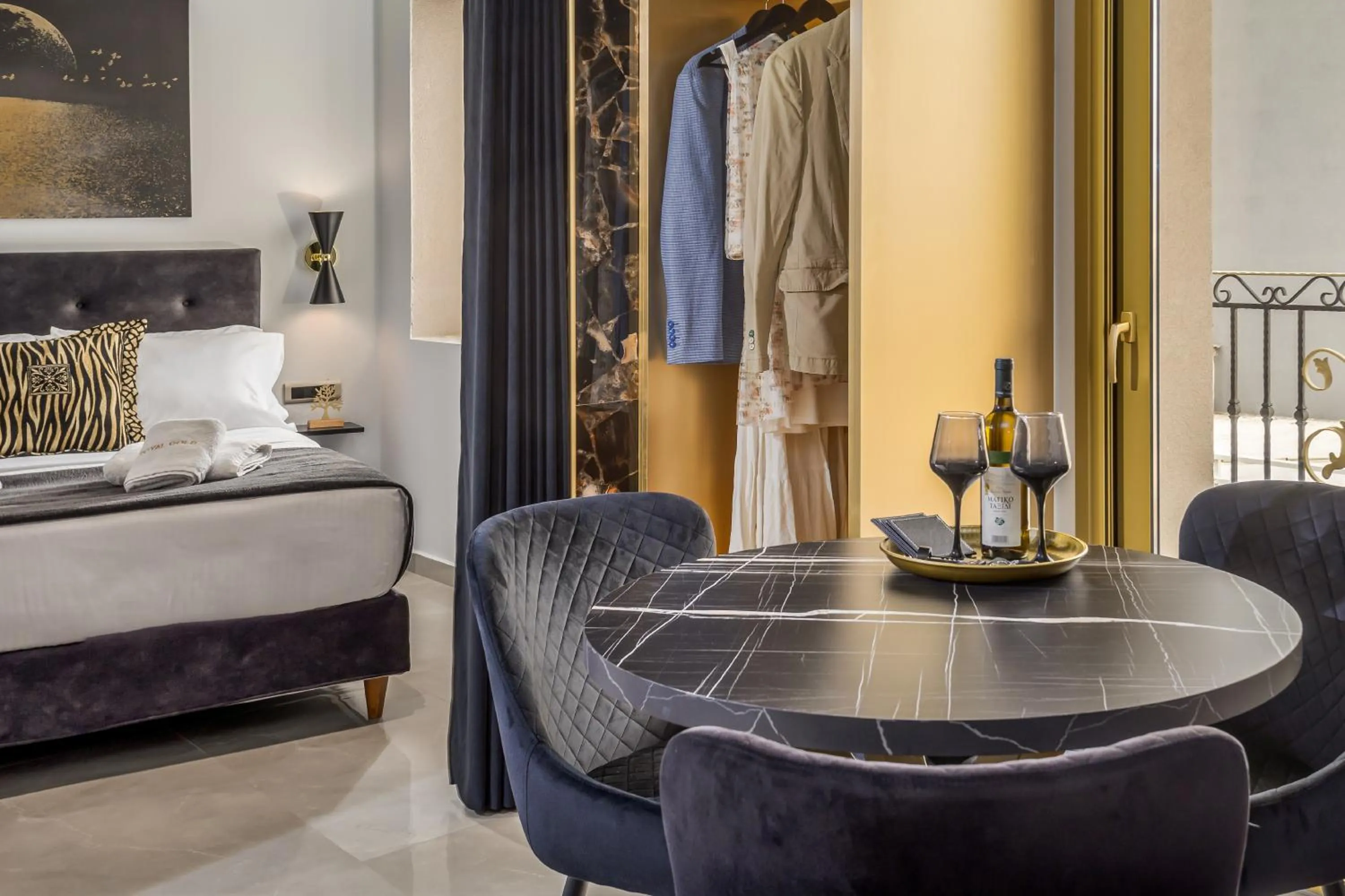 Bed in Royal Gold City Suites by Omilos Hotels