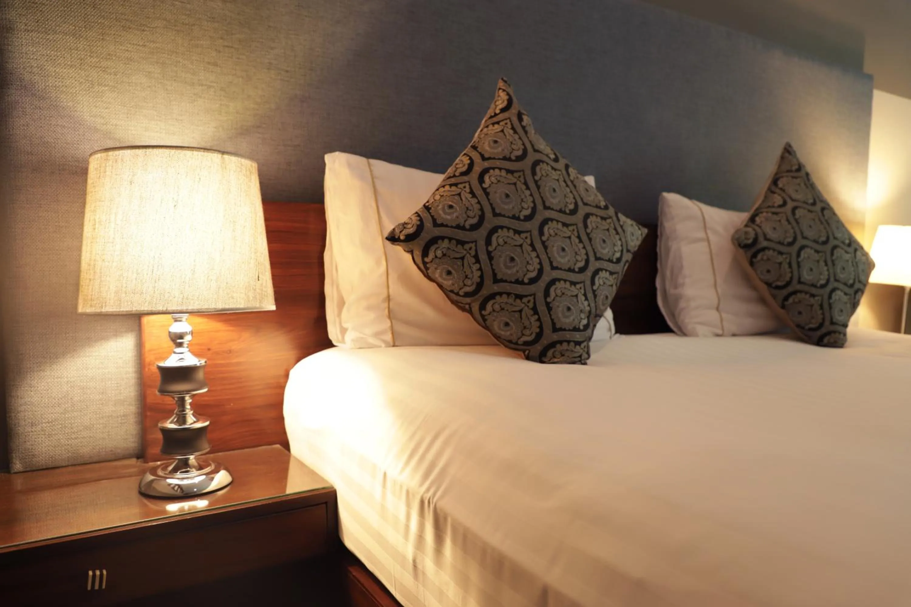 Bed in The Residency Hotel