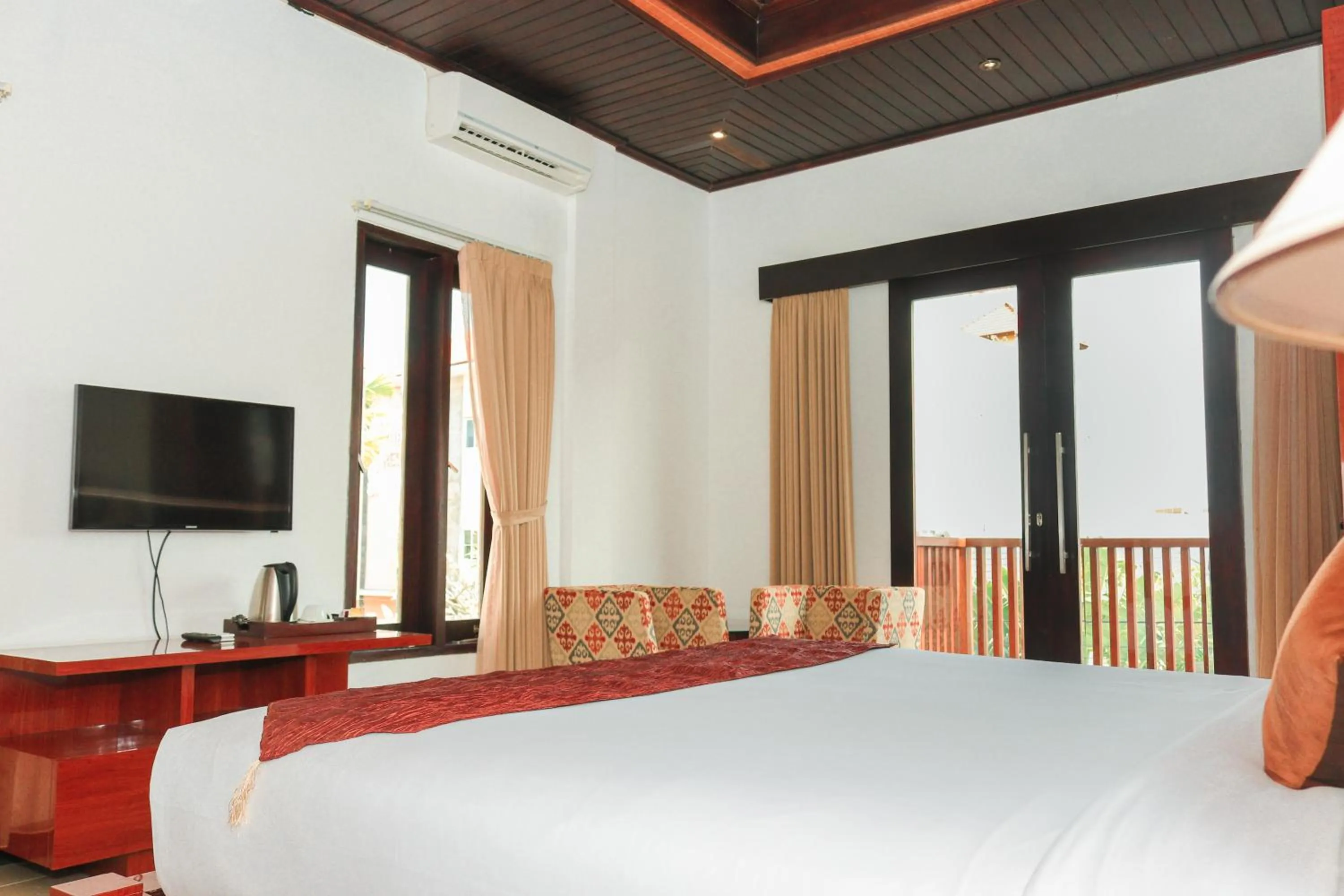 Bed in Argya Santi Suite and Villas