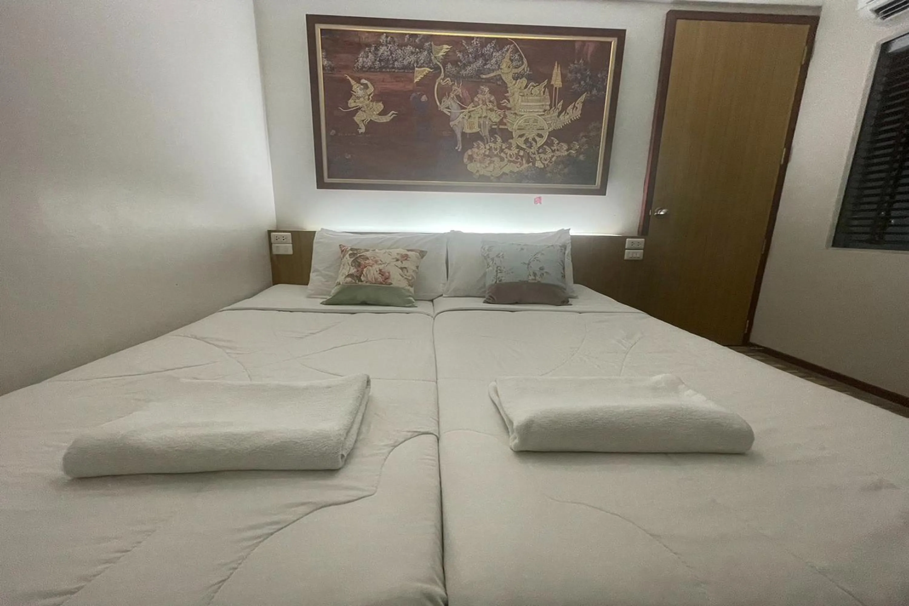 Bed in Landmark Patong Hotel