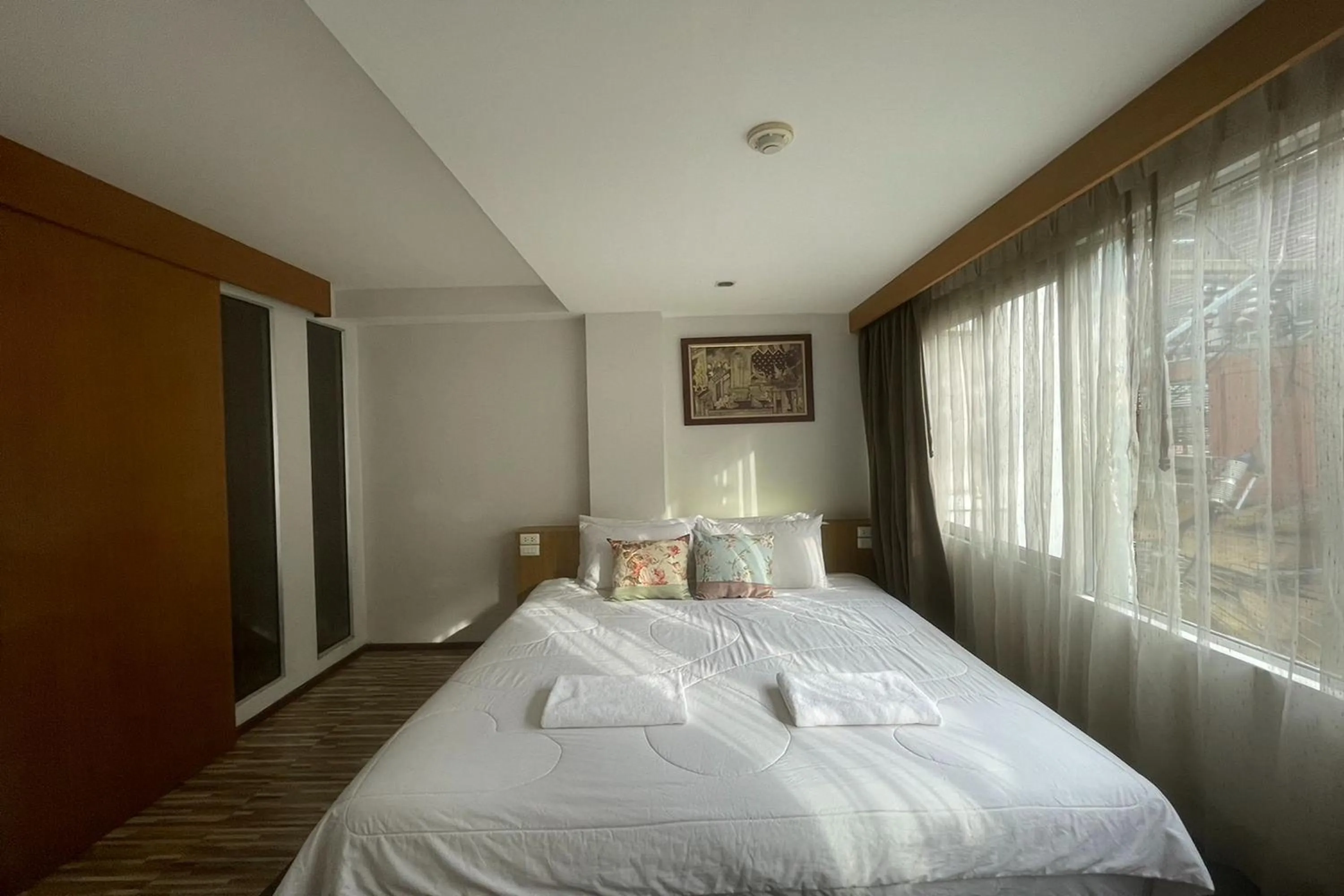 Bed in Landmark Patong Hotel