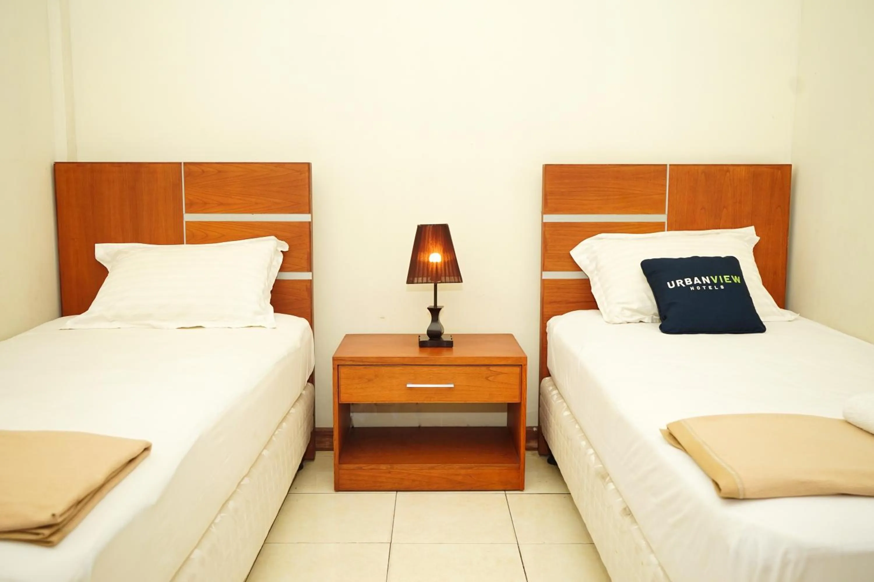 Bedroom, Bed in Urbanview Hotel Syariah Ratu Elok Banjarbaru by RedDoorz