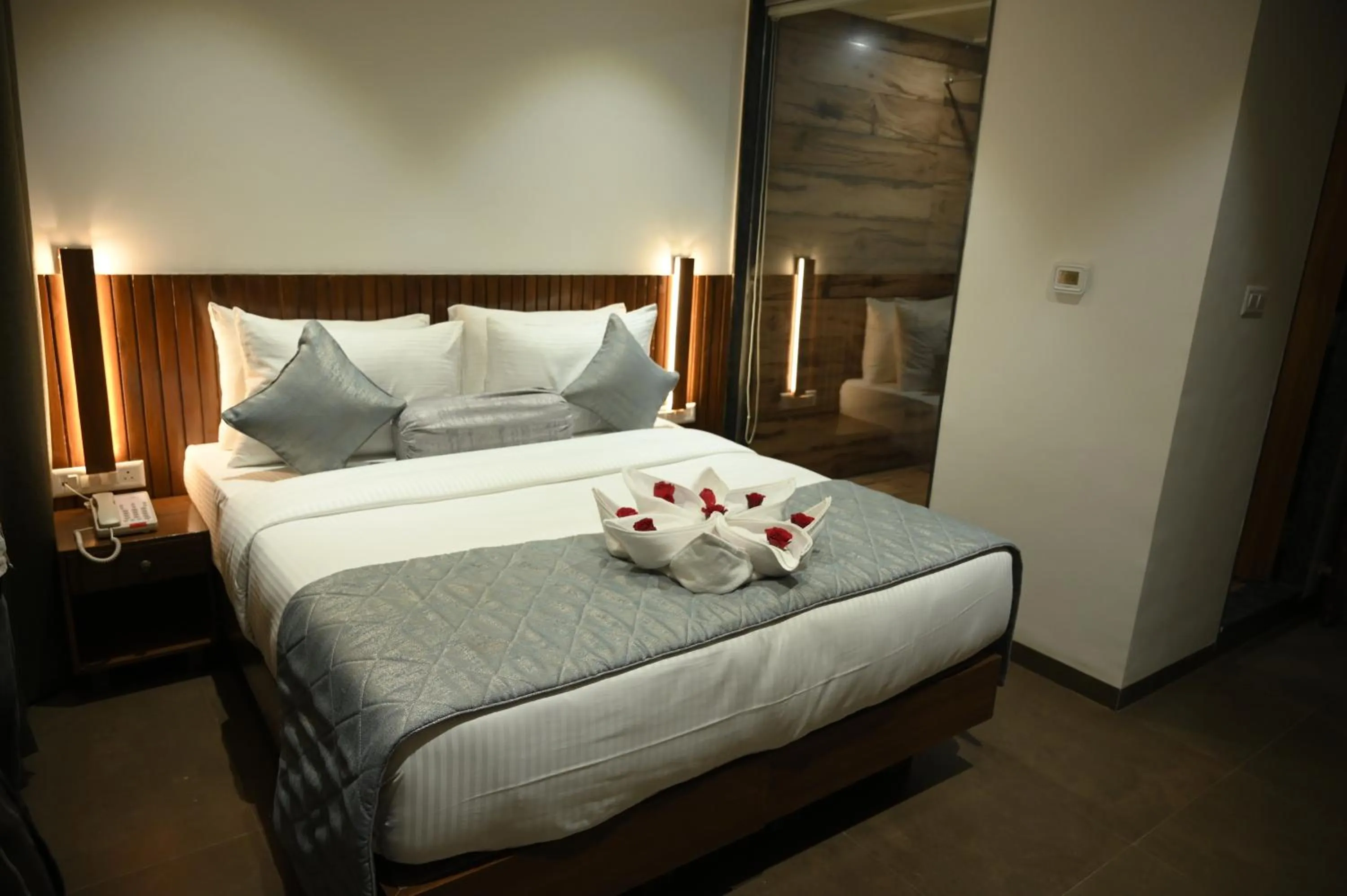 Bed in Mango Leaf Lake Resort