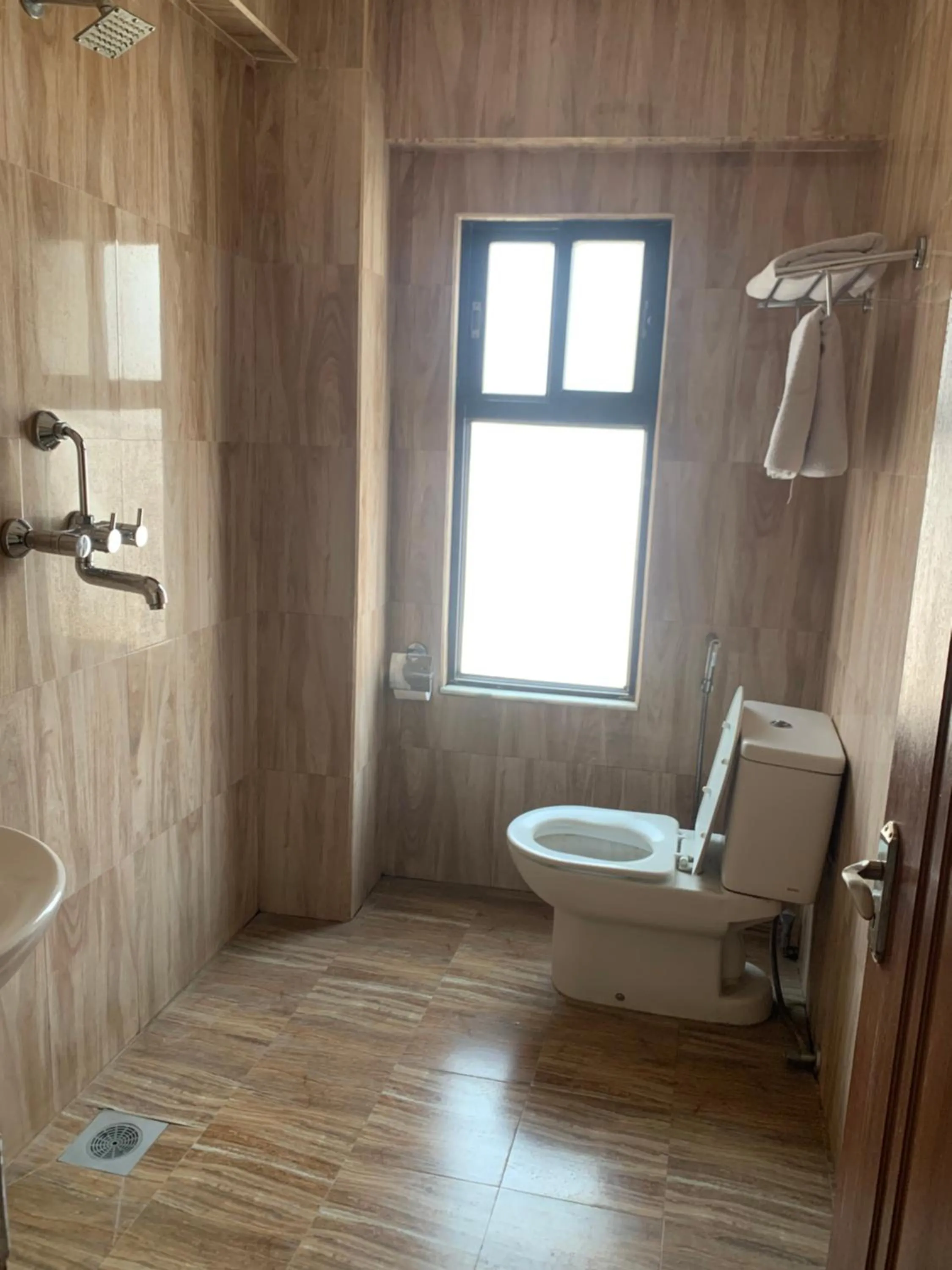 Toilet in Alpine Hotel & Apartment