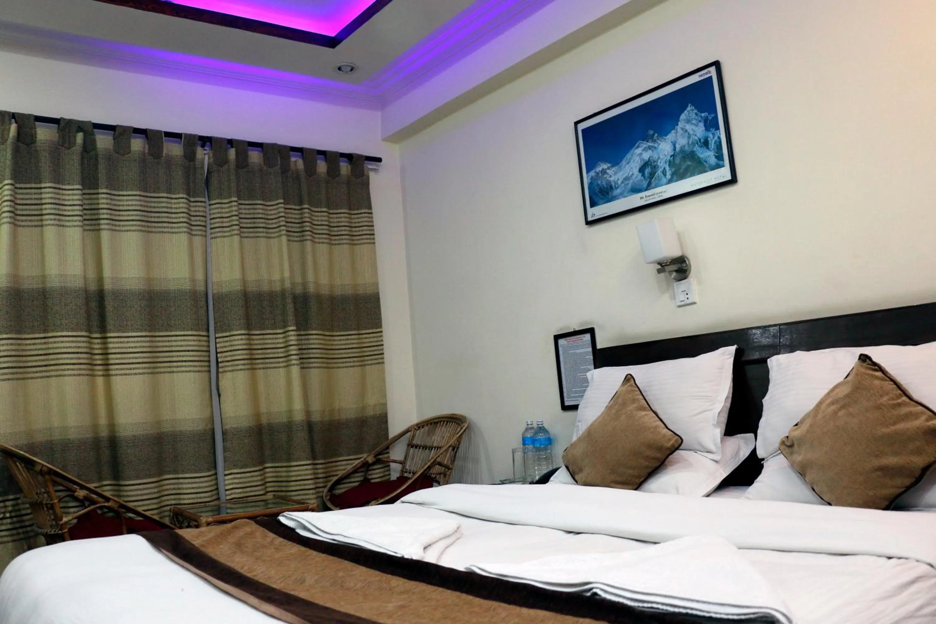 Bedroom in Alpine Hotel & Apartment