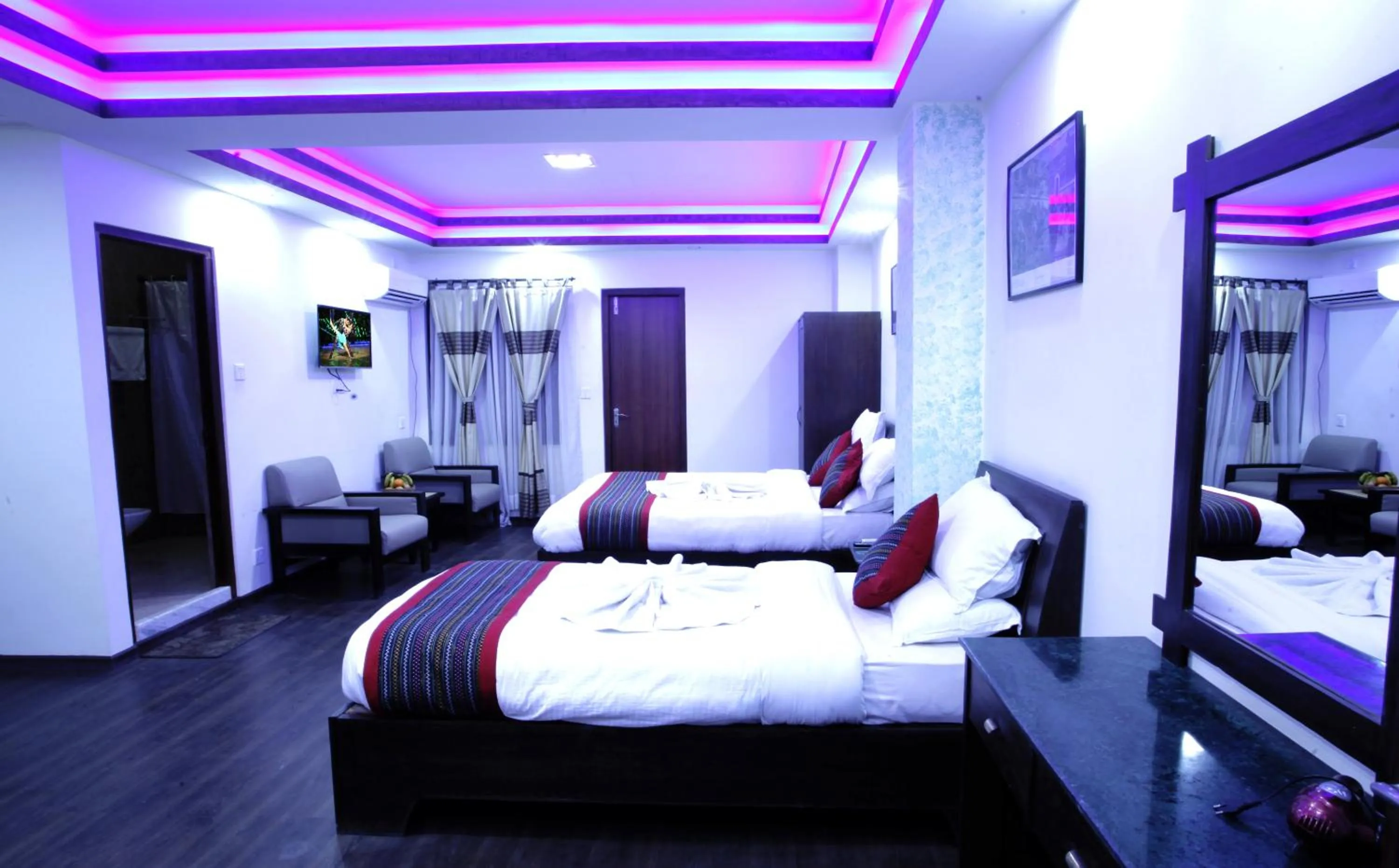 Bed in Alpine Hotel & Apartment