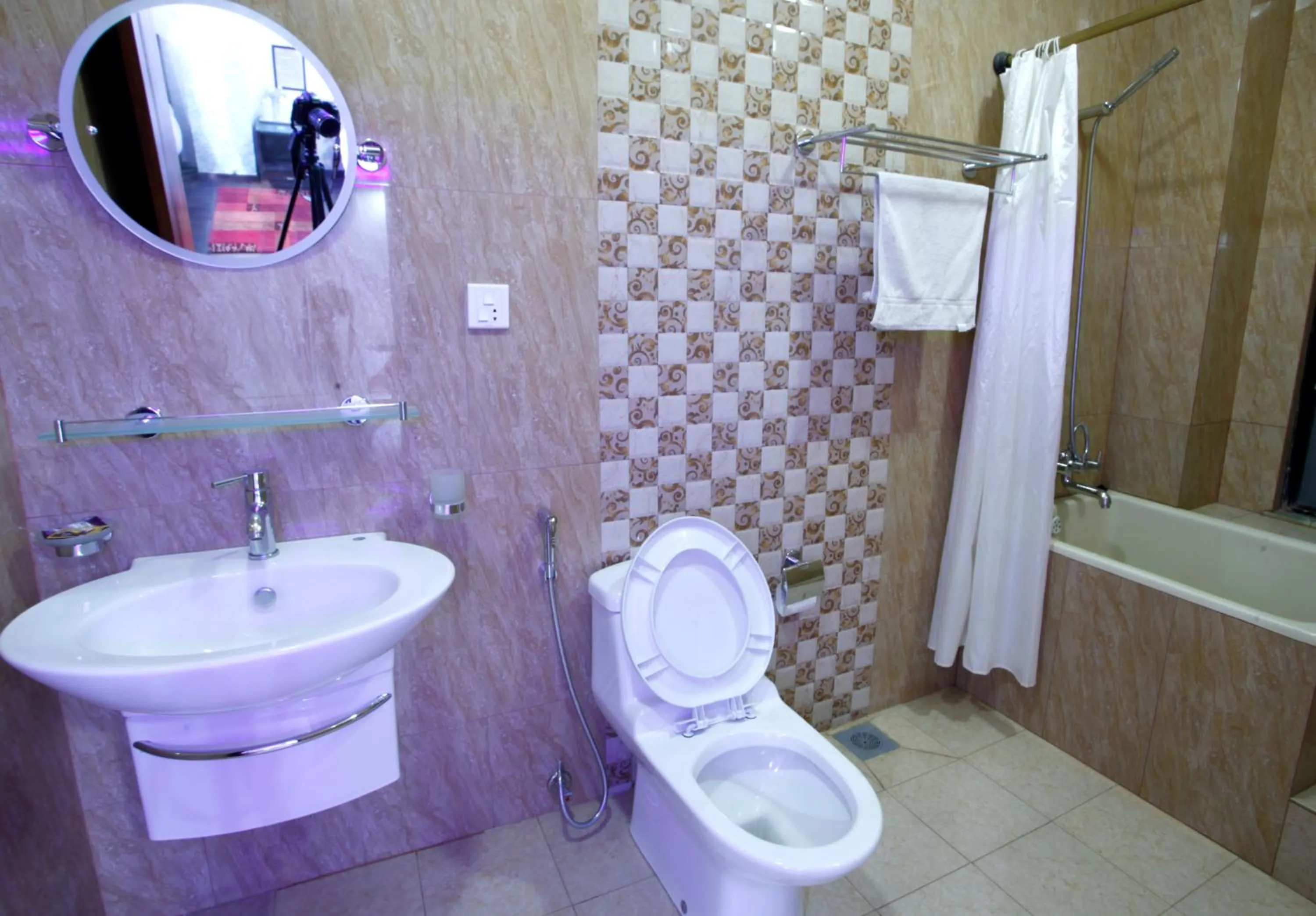 Bathroom in Alpine Hotel & Apartment