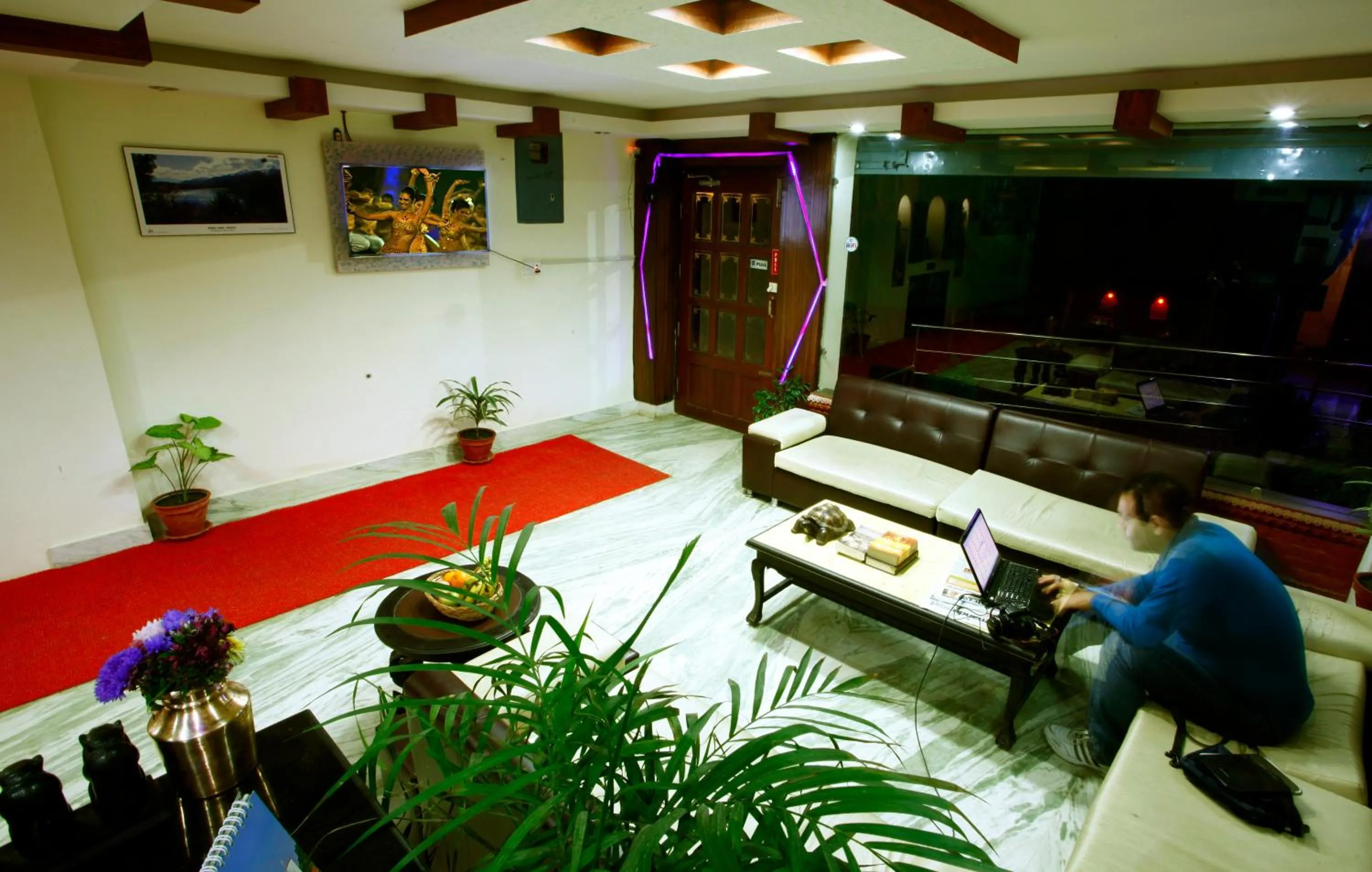 Lobby or reception in Alpine Hotel & Apartment