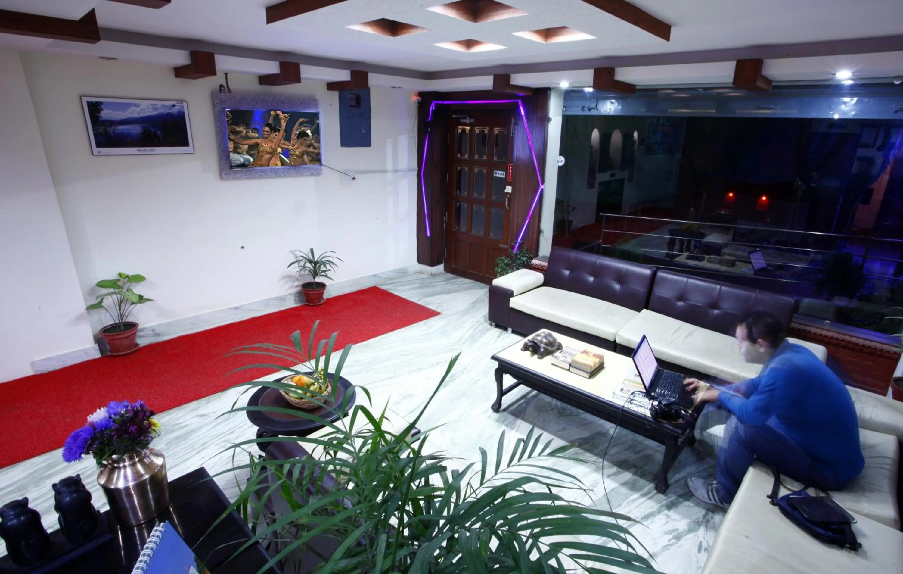 Lobby or reception in Alpine Hotel & Apartment