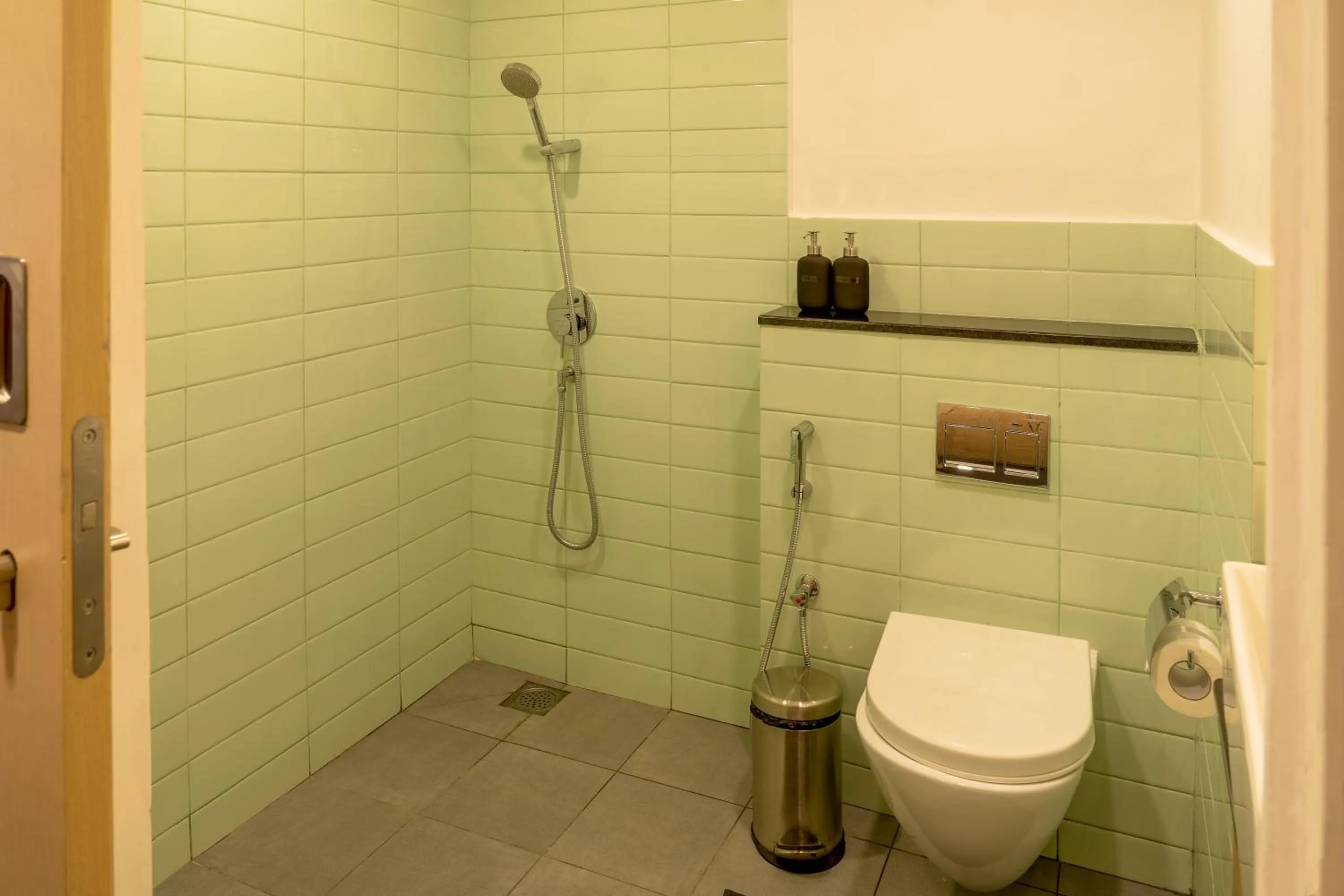Bathroom in Olive Hotel Brookefield by Embassy Group