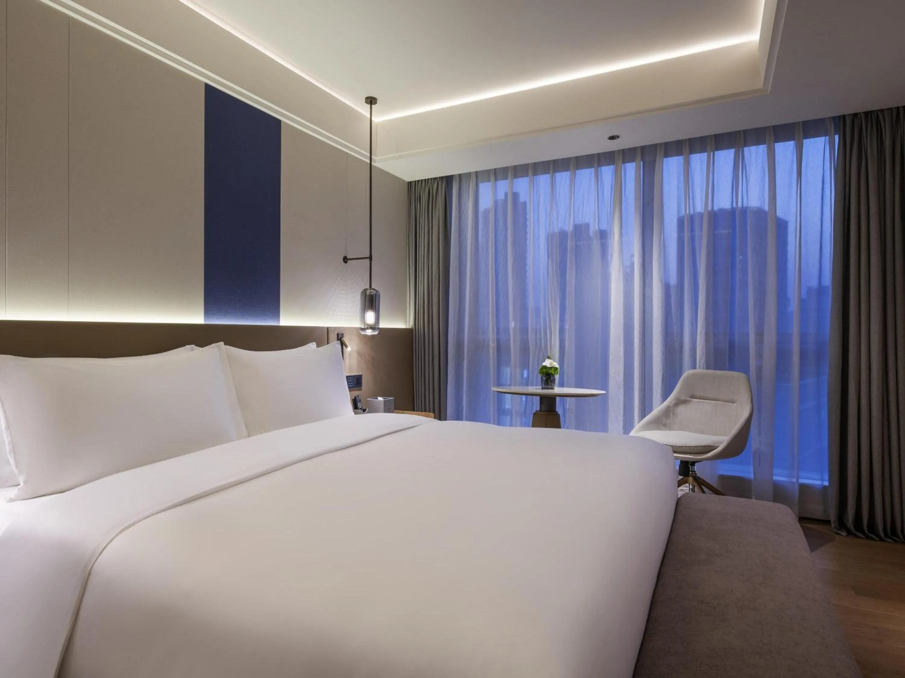 Photo of the whole room, Bed in Novotel Shanghai JingAn