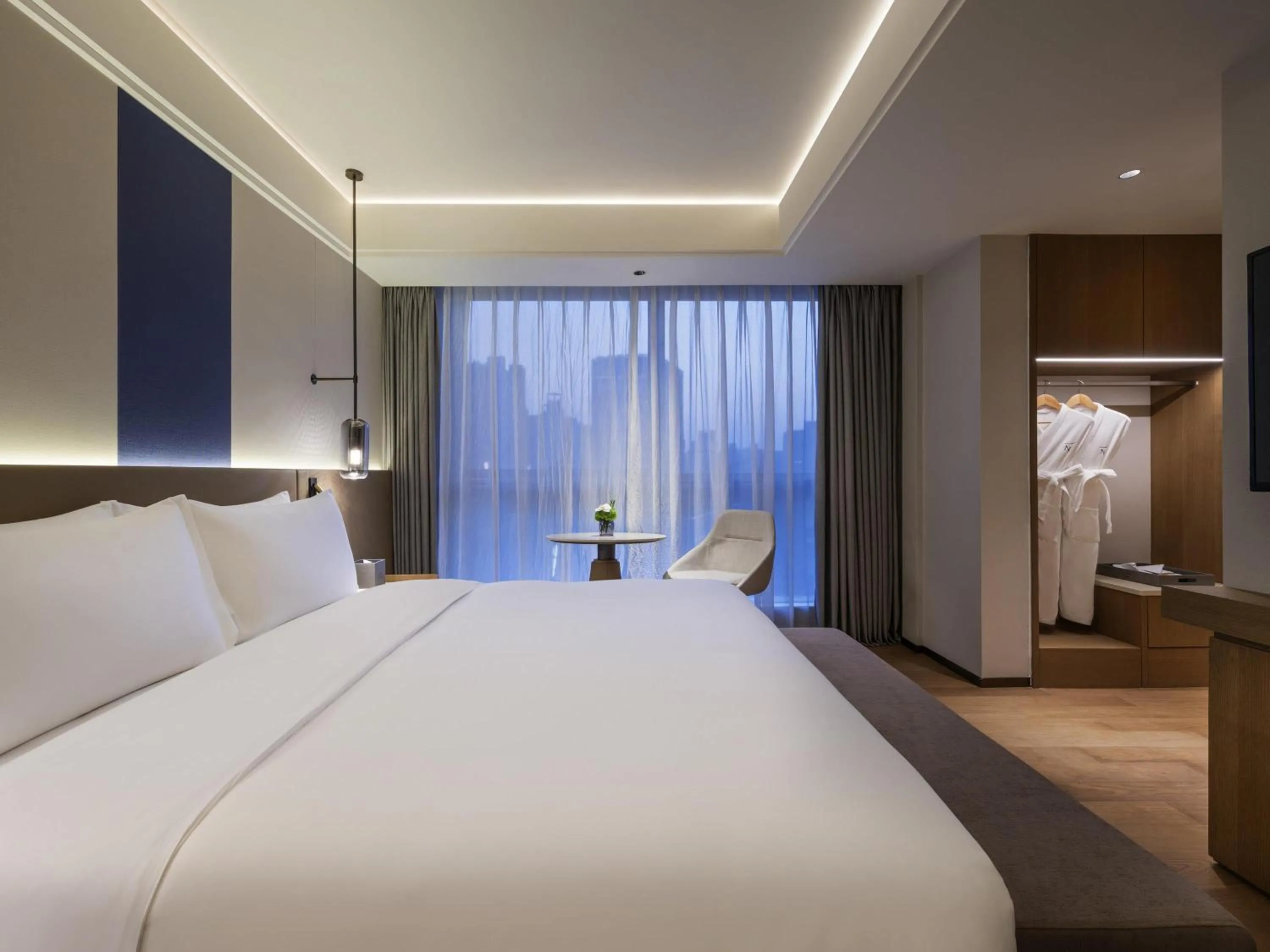 Photo of the whole room, Bed in Novotel Shanghai JingAn