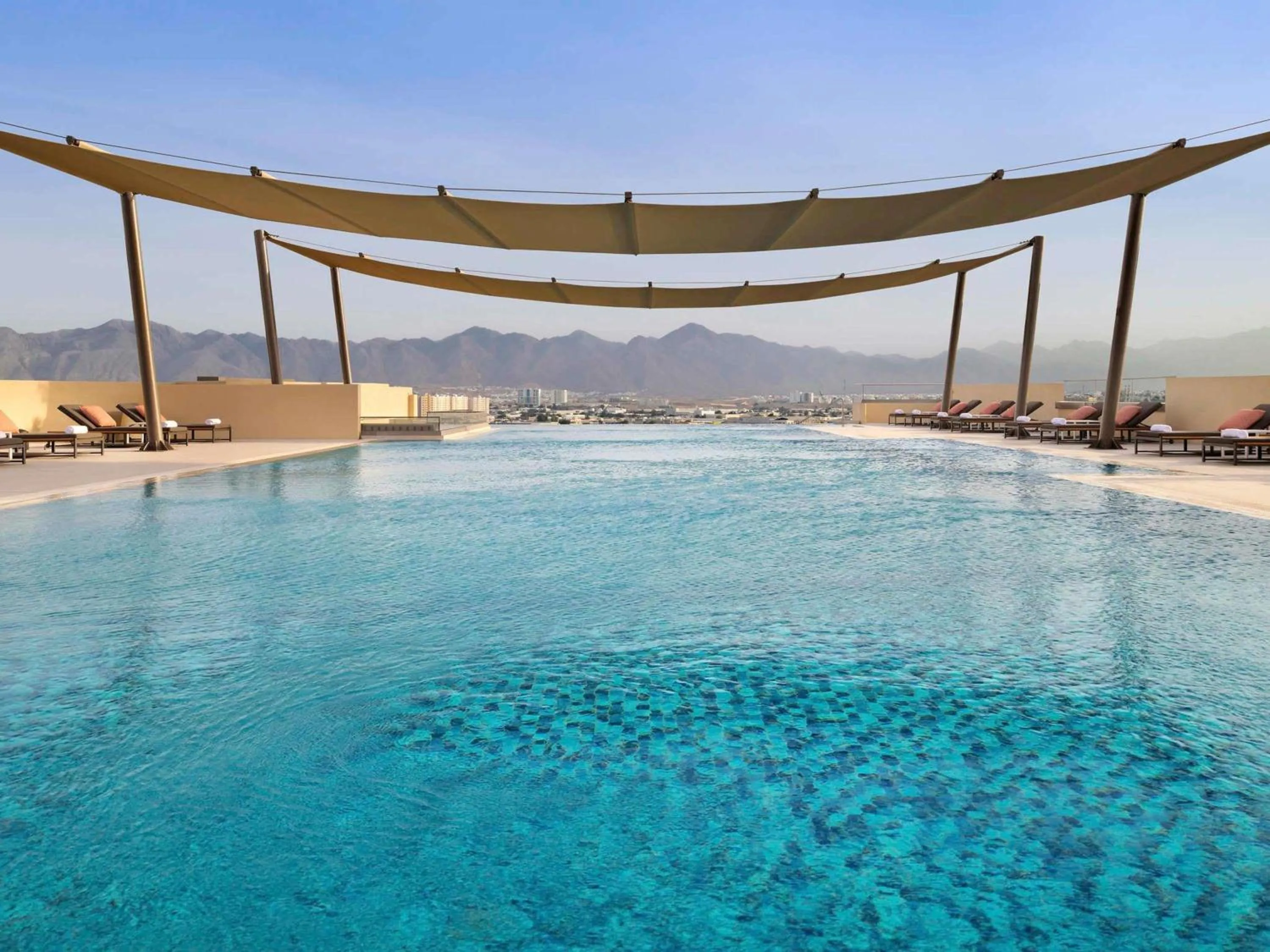 Pool view in Mövenpick Hotel & Apartments Ghala Muscat