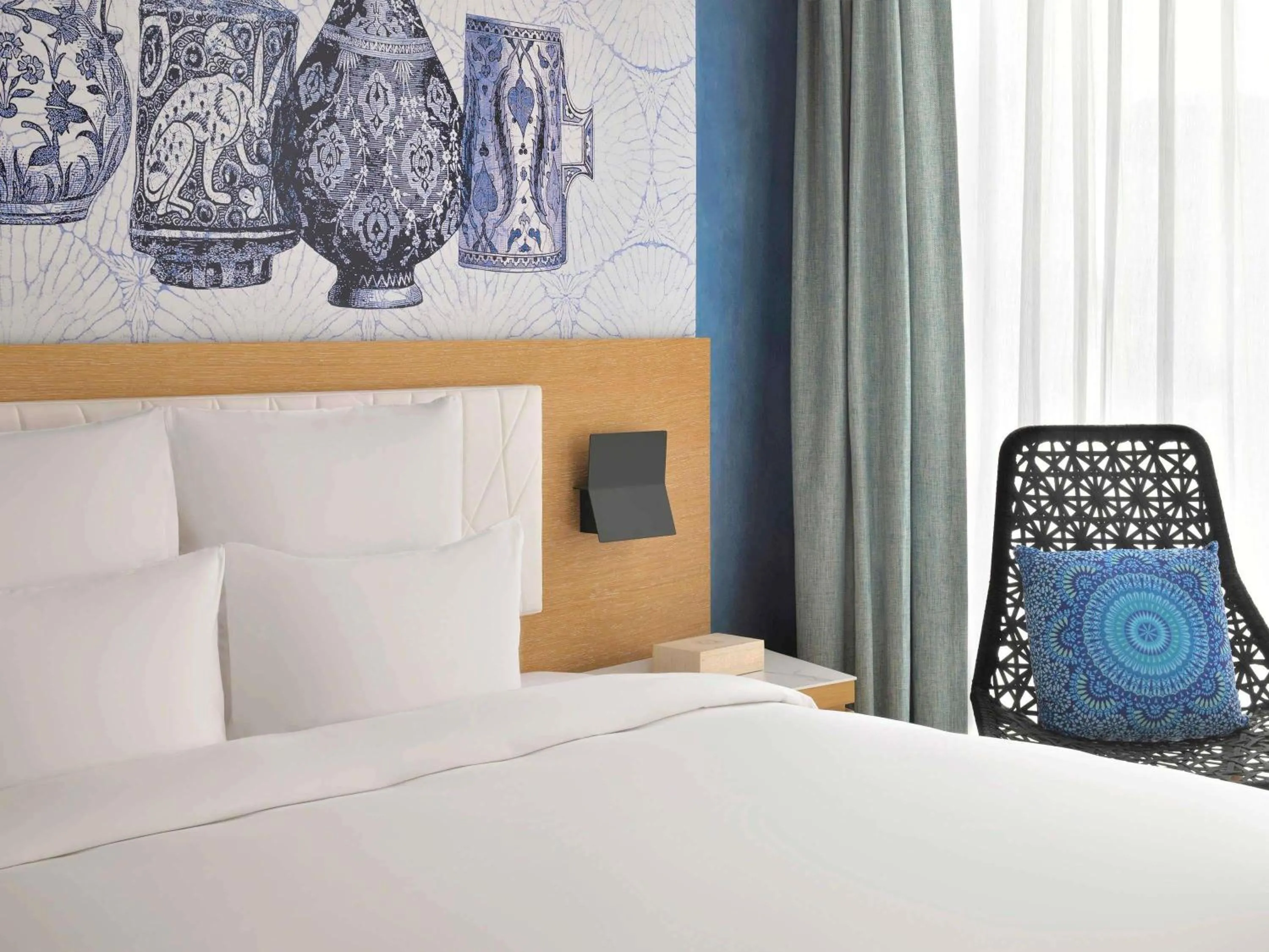 Bedroom, Bed in Mövenpick Hotel & Apartments Ghala Muscat