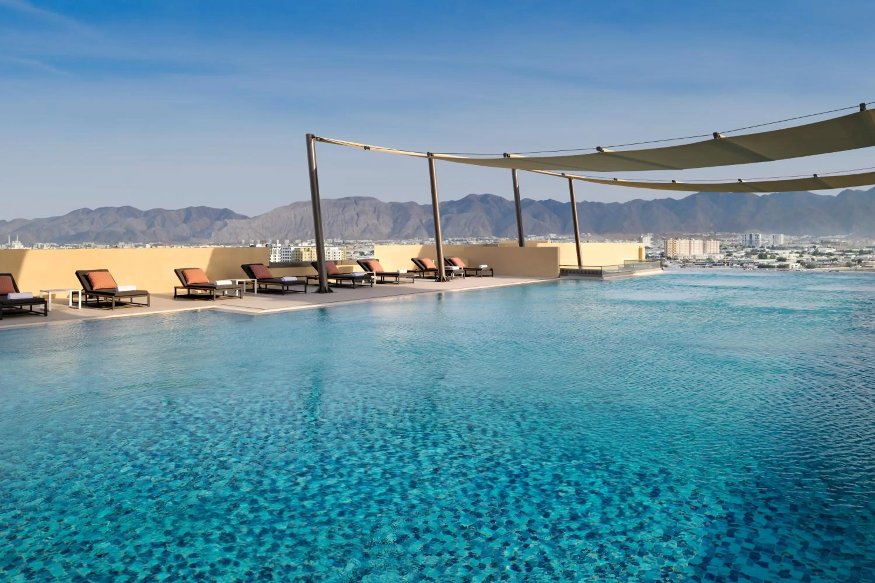 Swimming pool in Mövenpick Hotel & Apartments Ghala Muscat