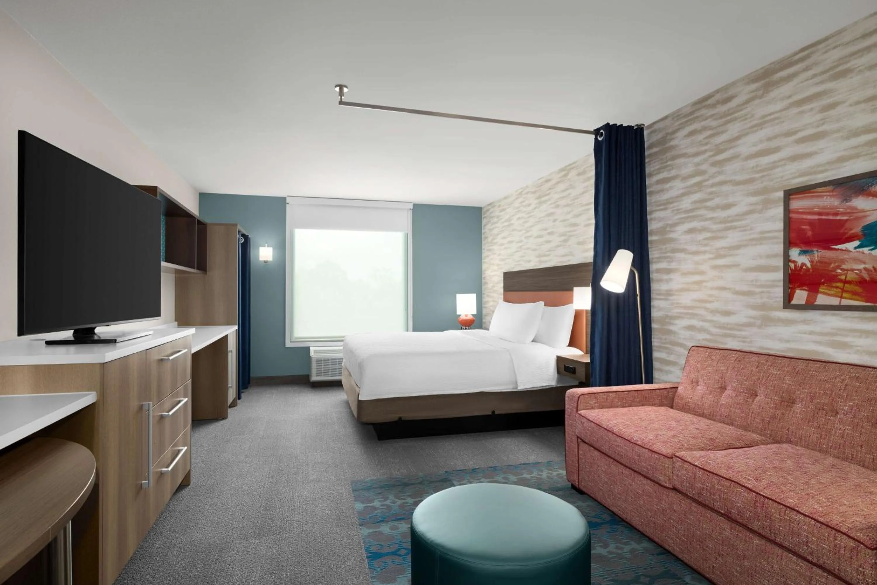 Living room, Bed in Home2 Suites By Hilton Niceville Eglin Air Force Base