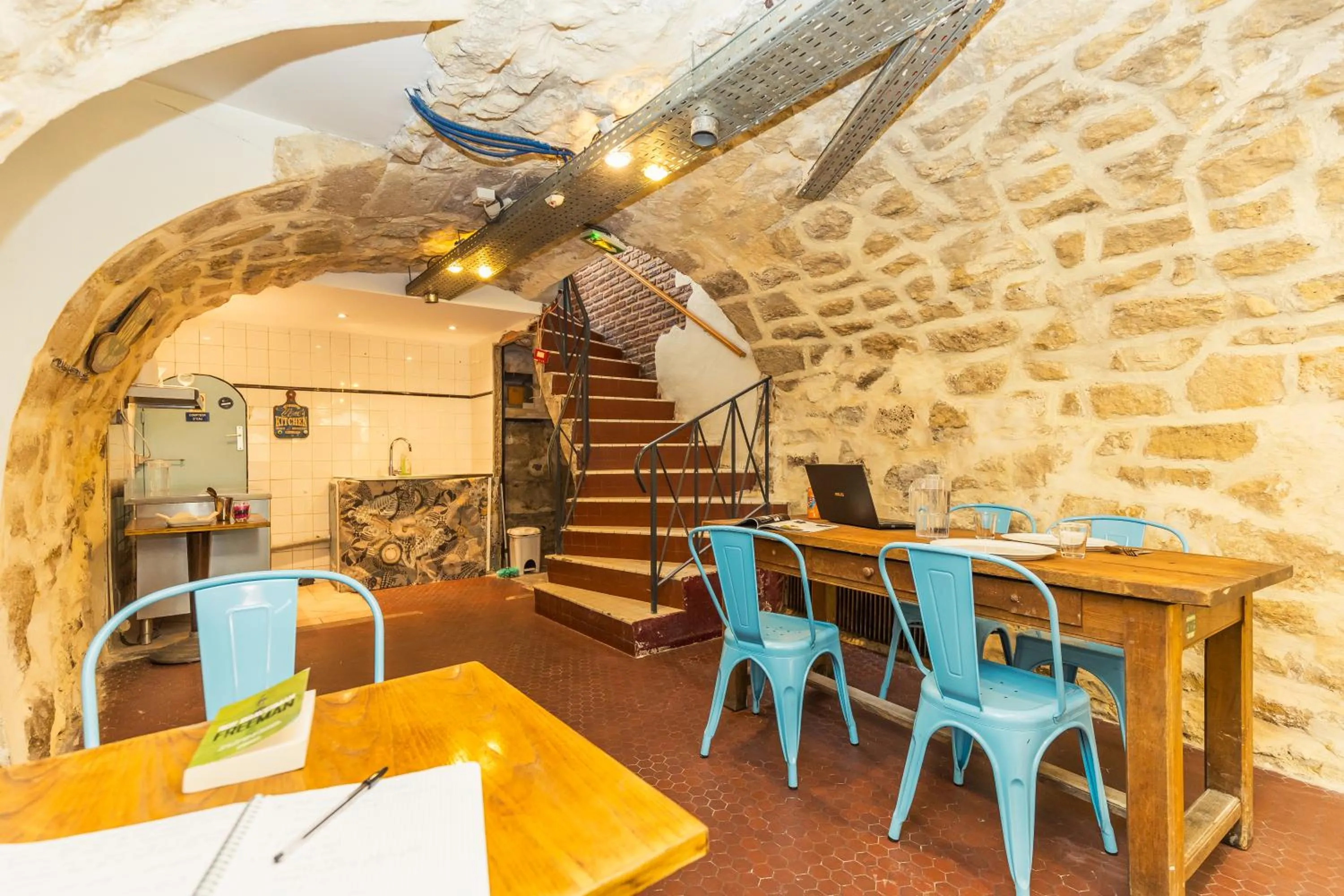 Seating area in Young and Happy Latin Quarter by Hiphophostels