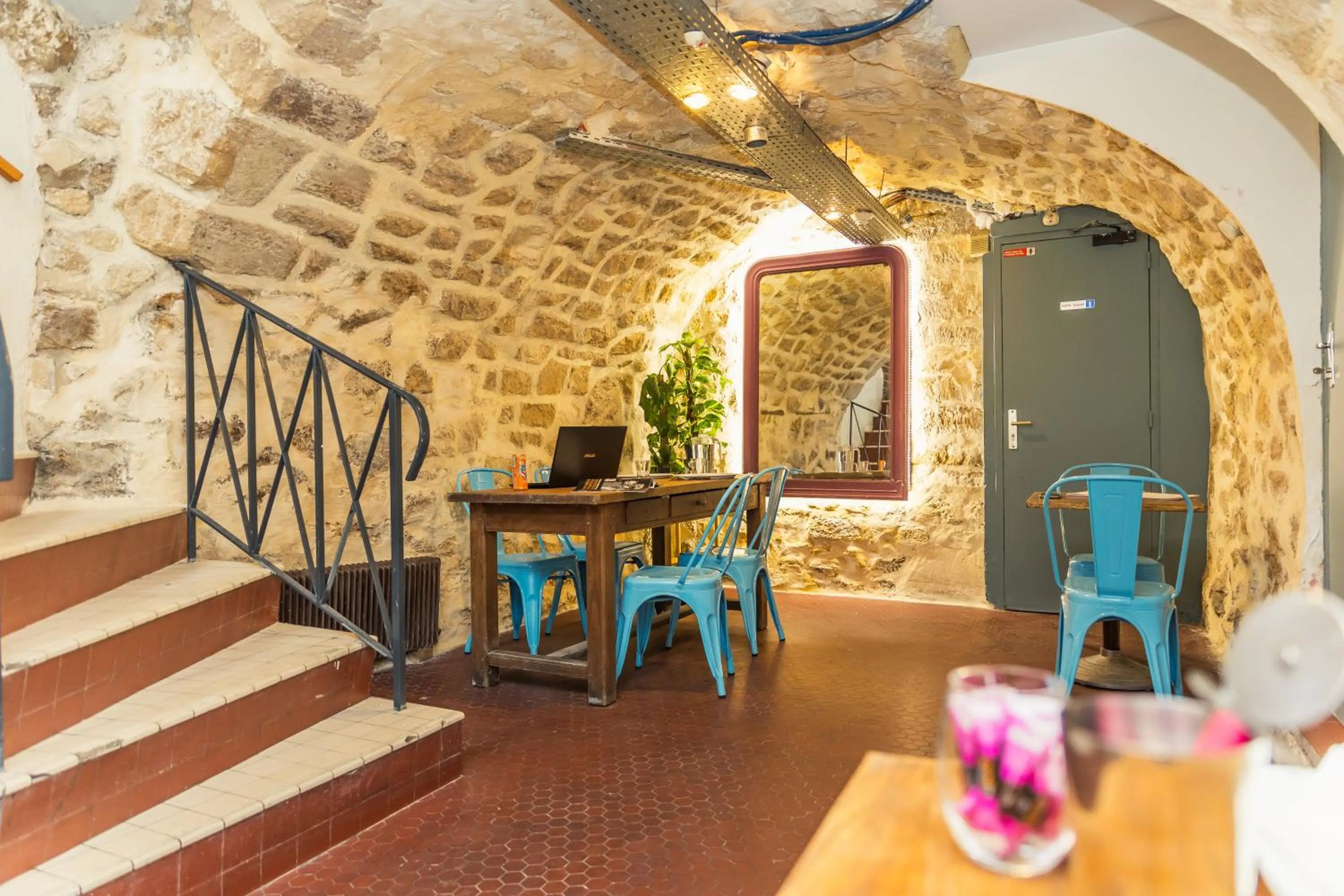 Seating area in Young and Happy Latin Quarter by Hiphophostels