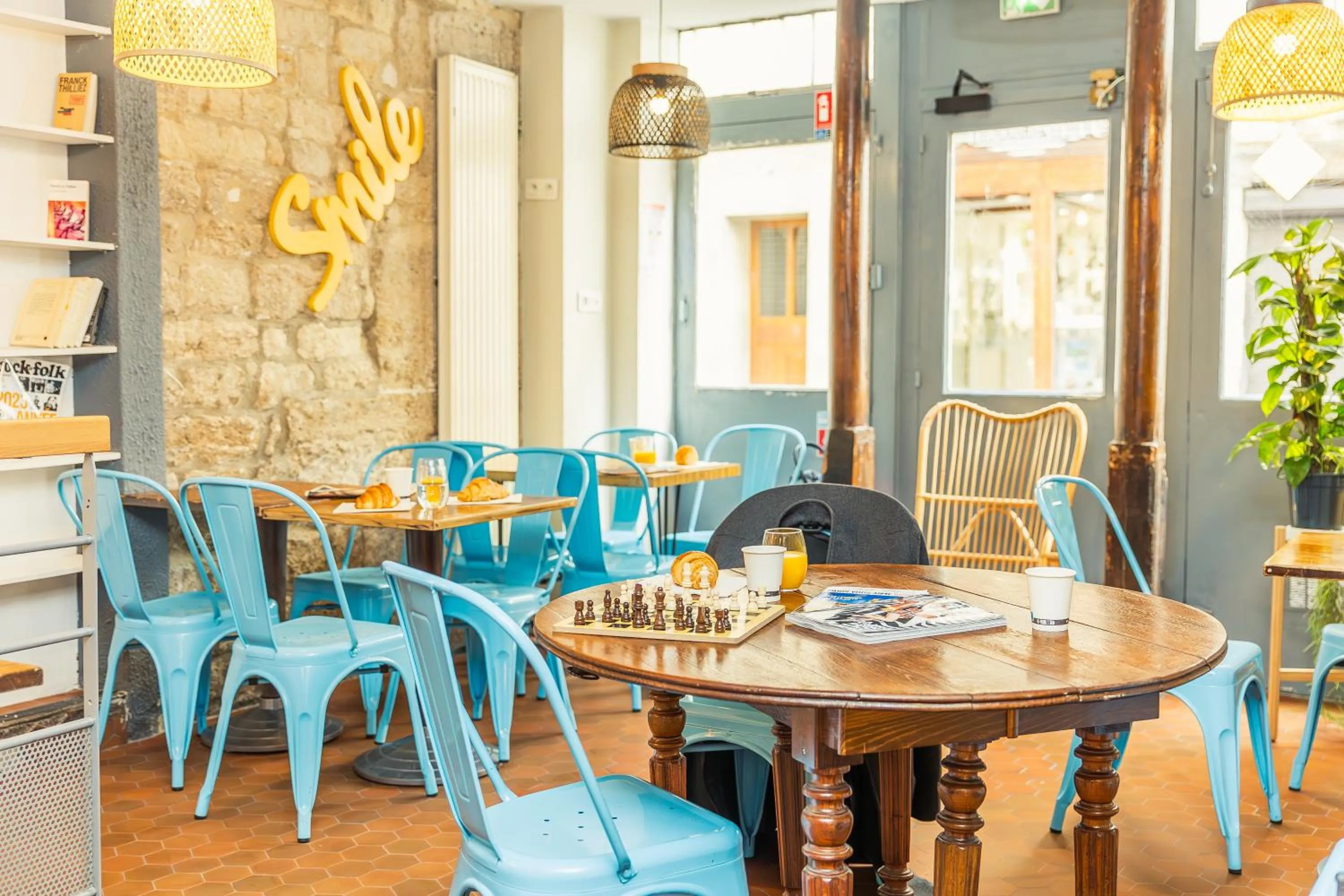 Seating area in Young and Happy Latin Quarter by Hiphophostels
