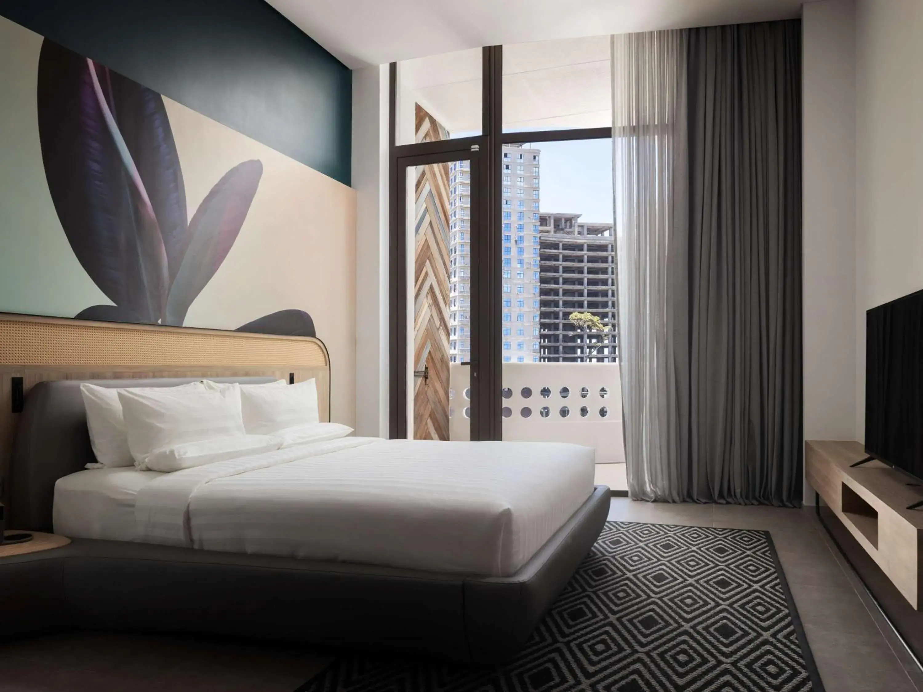 Superior Suite with One Double Bed and Two Single Beds - City View in Novotel Sihanoukville Holiday Resort Superior Suite with One Double Bed and Two Single Beds - City View in Novotel Sihanoukville Holiday Resort