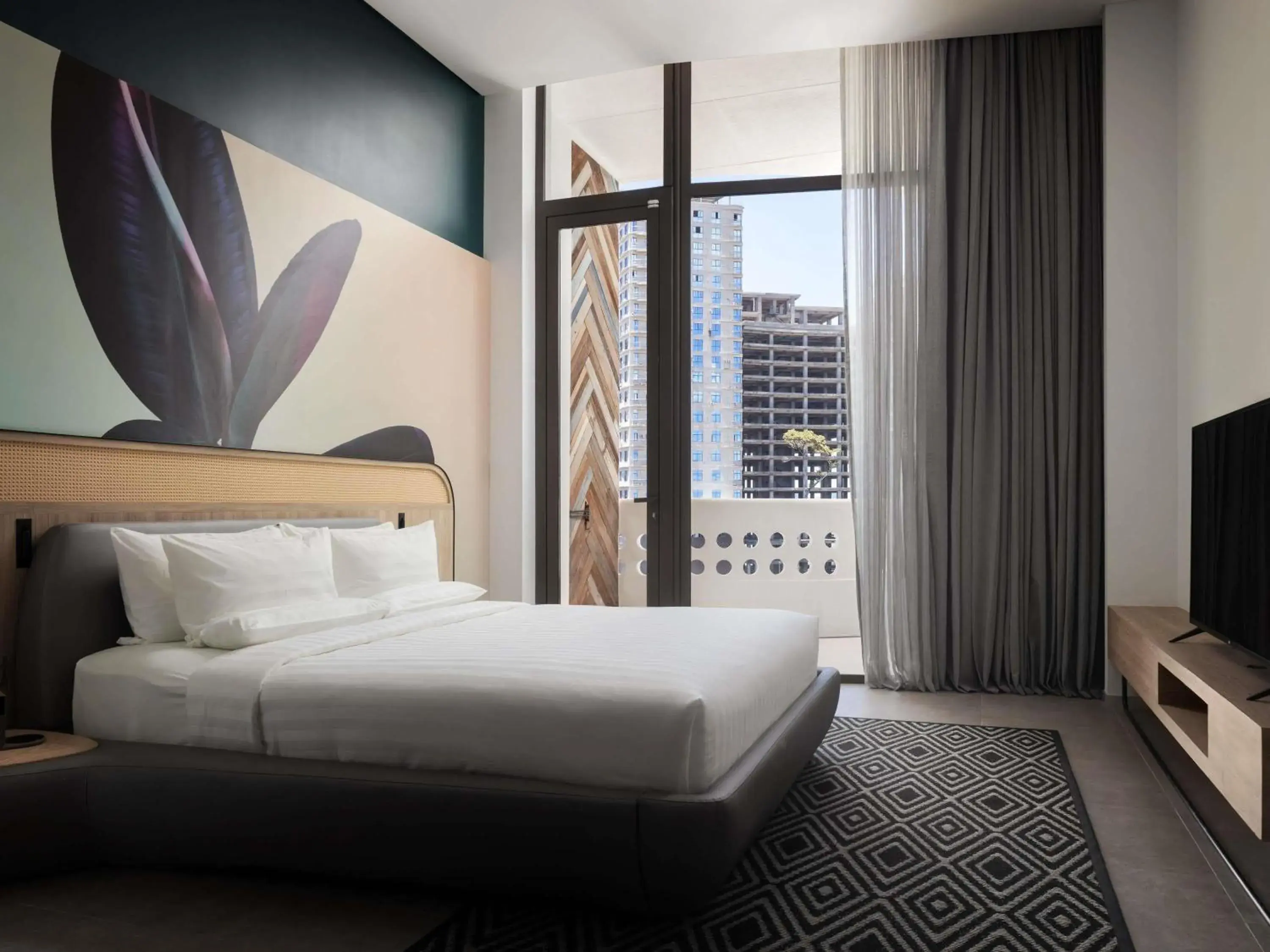 Superior Suite with One Double Bed and Two Single Beds - City View in Novotel Sihanoukville Holiday Resort Superior Suite with One Double Bed and Two Single Beds - City View in Novotel Sihanoukville Holiday Resort