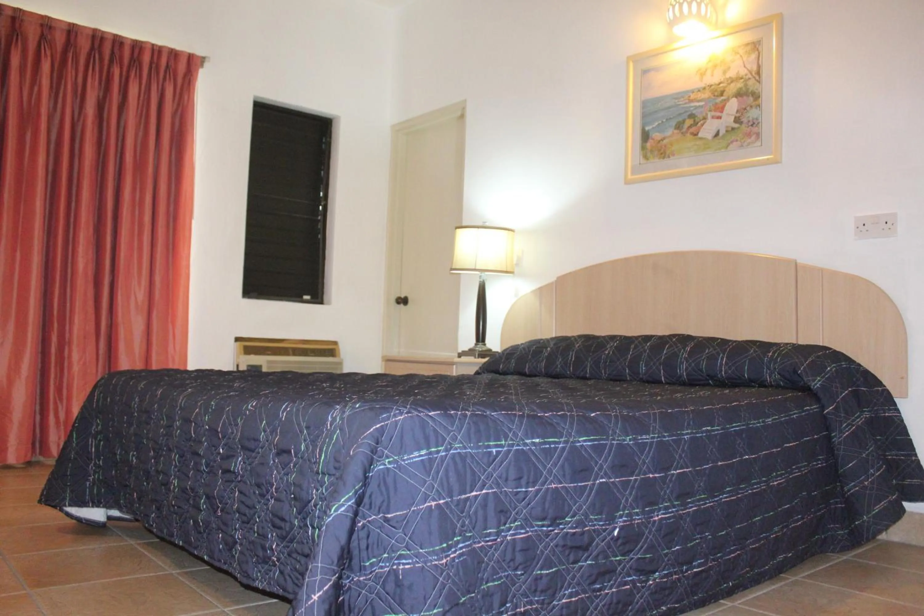 Bed in Allamanda Beach Resort