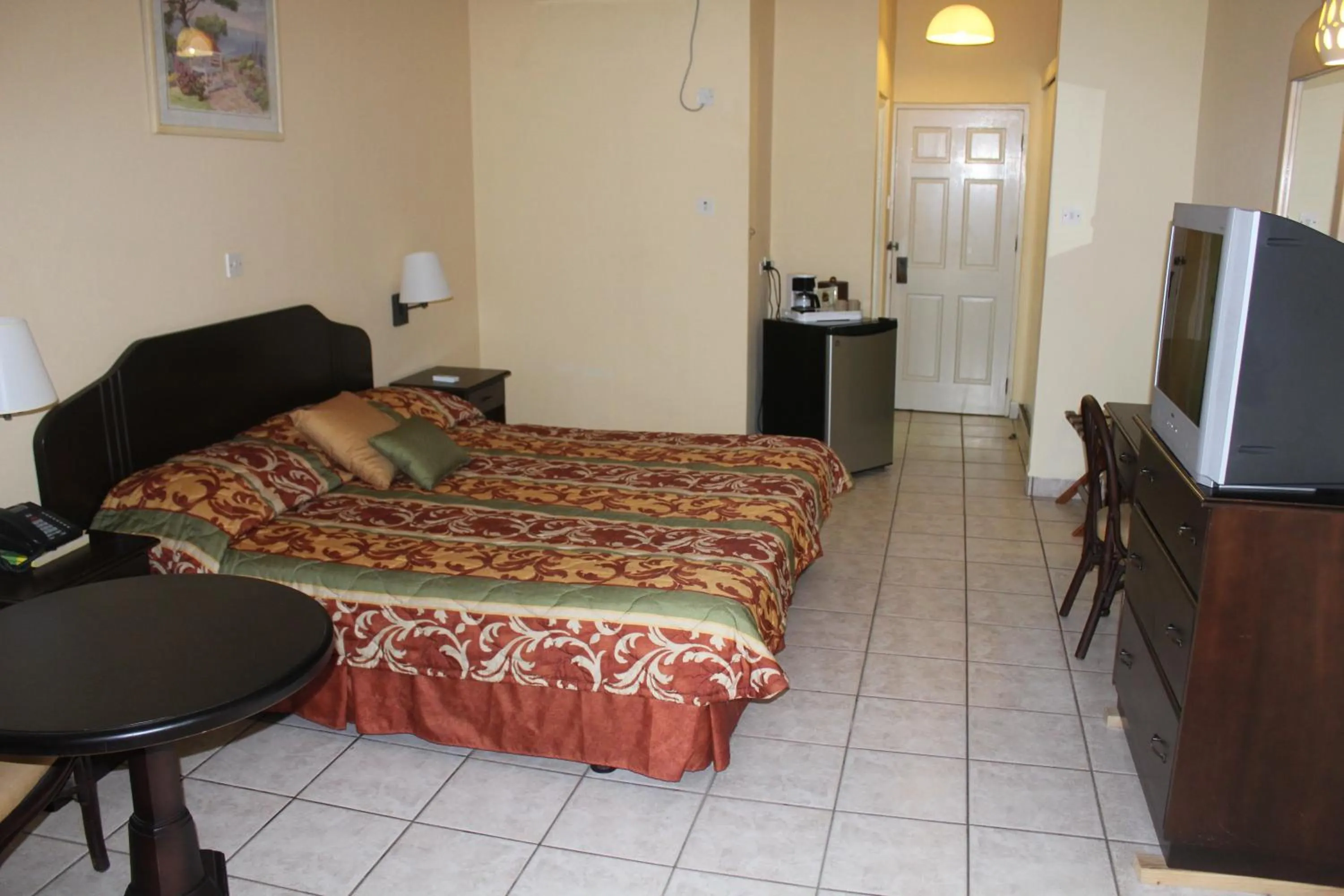 Photo of the whole room, Bed in Allamanda Beach Resort