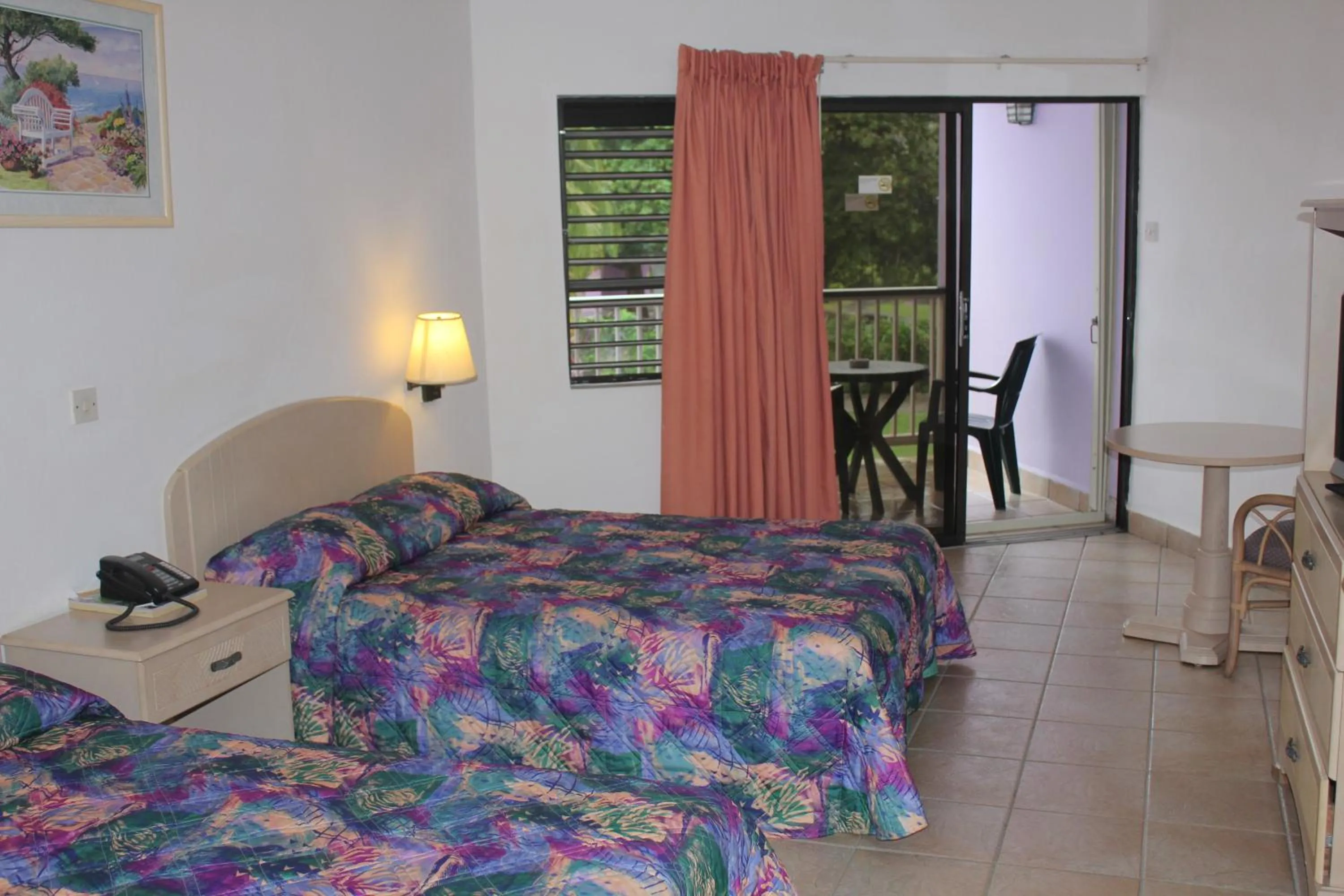 Photo of the whole room, Bed in Allamanda Beach Resort