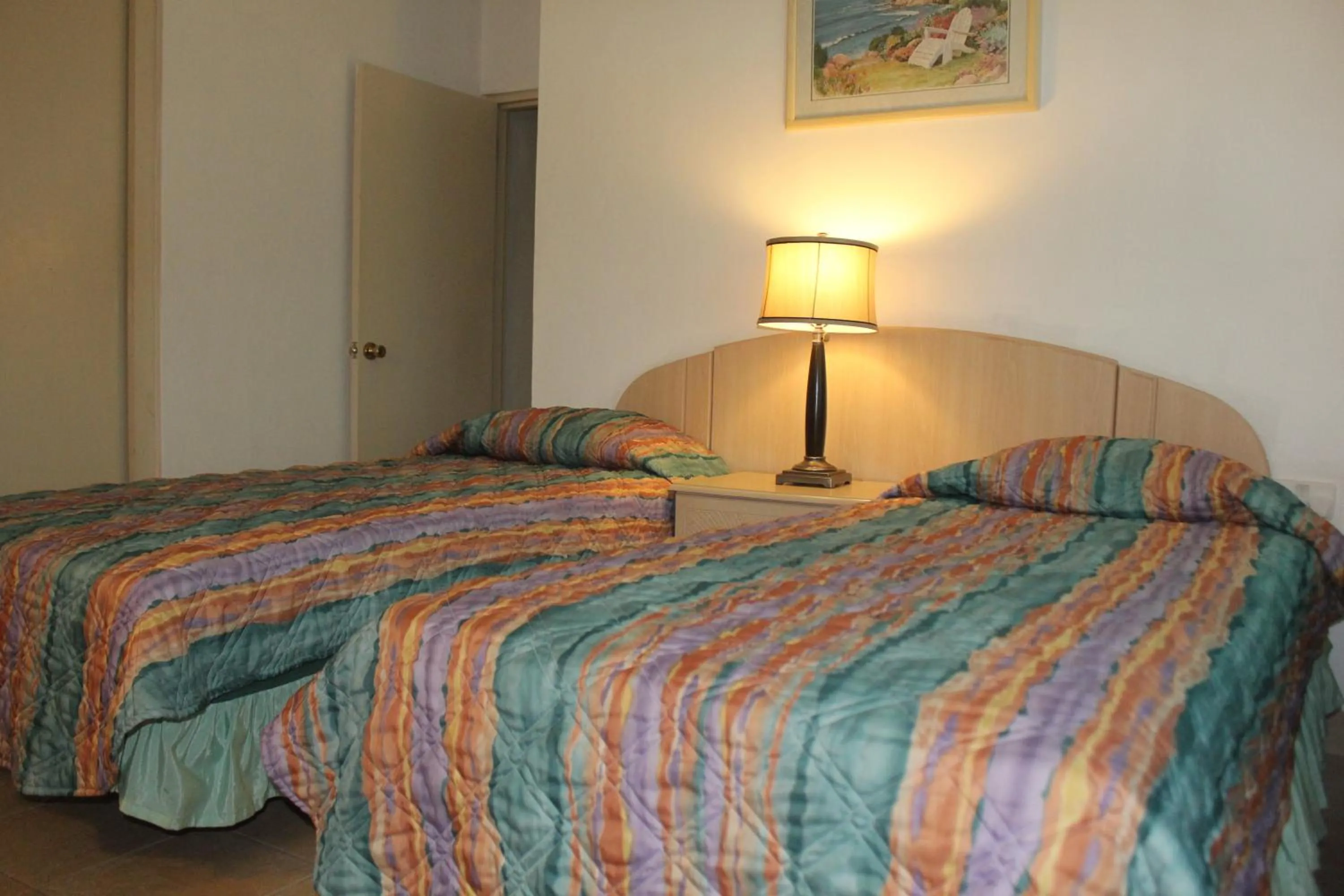 Bed in Allamanda Beach Resort