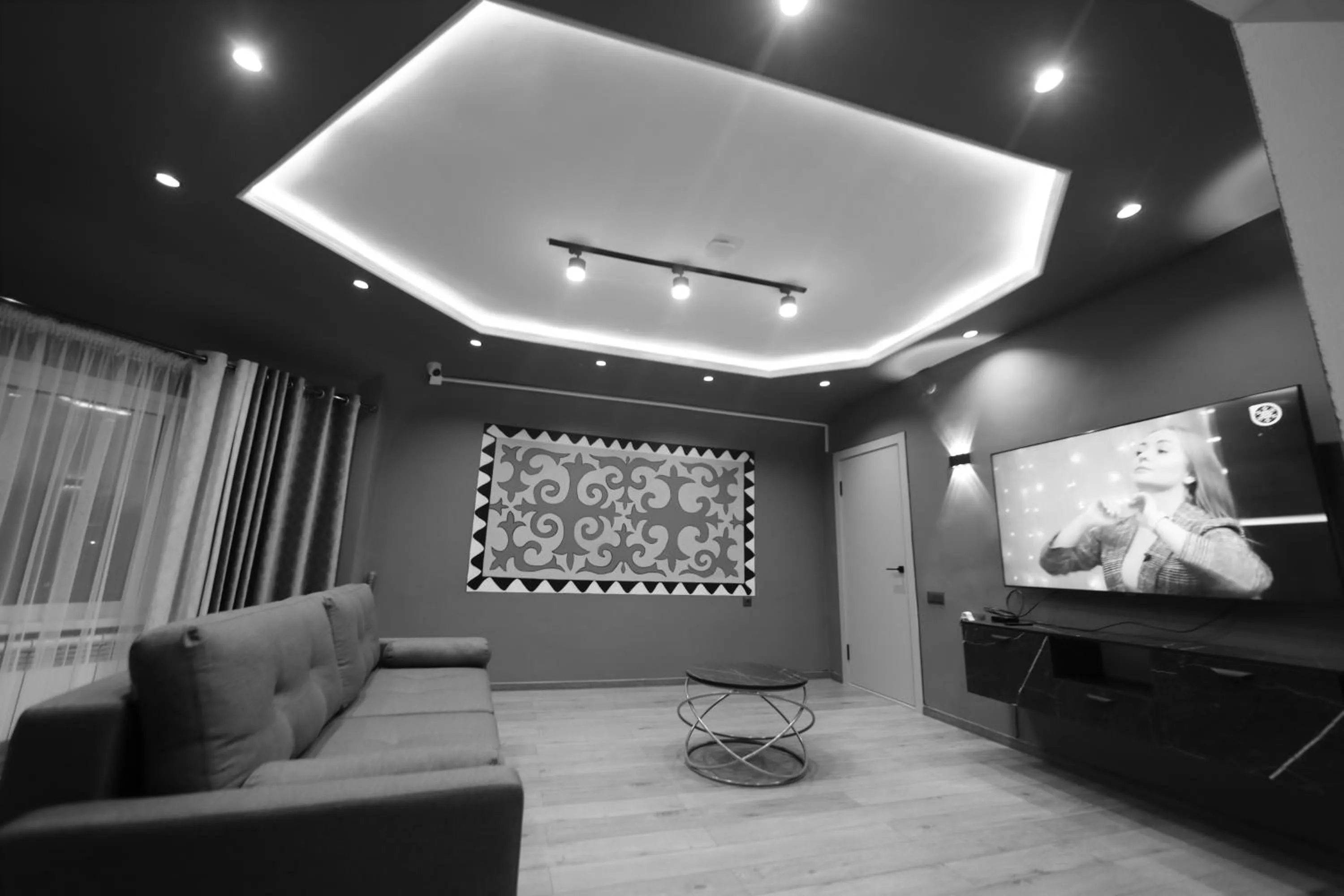 Communal lounge/ TV room in Cozy Hostel