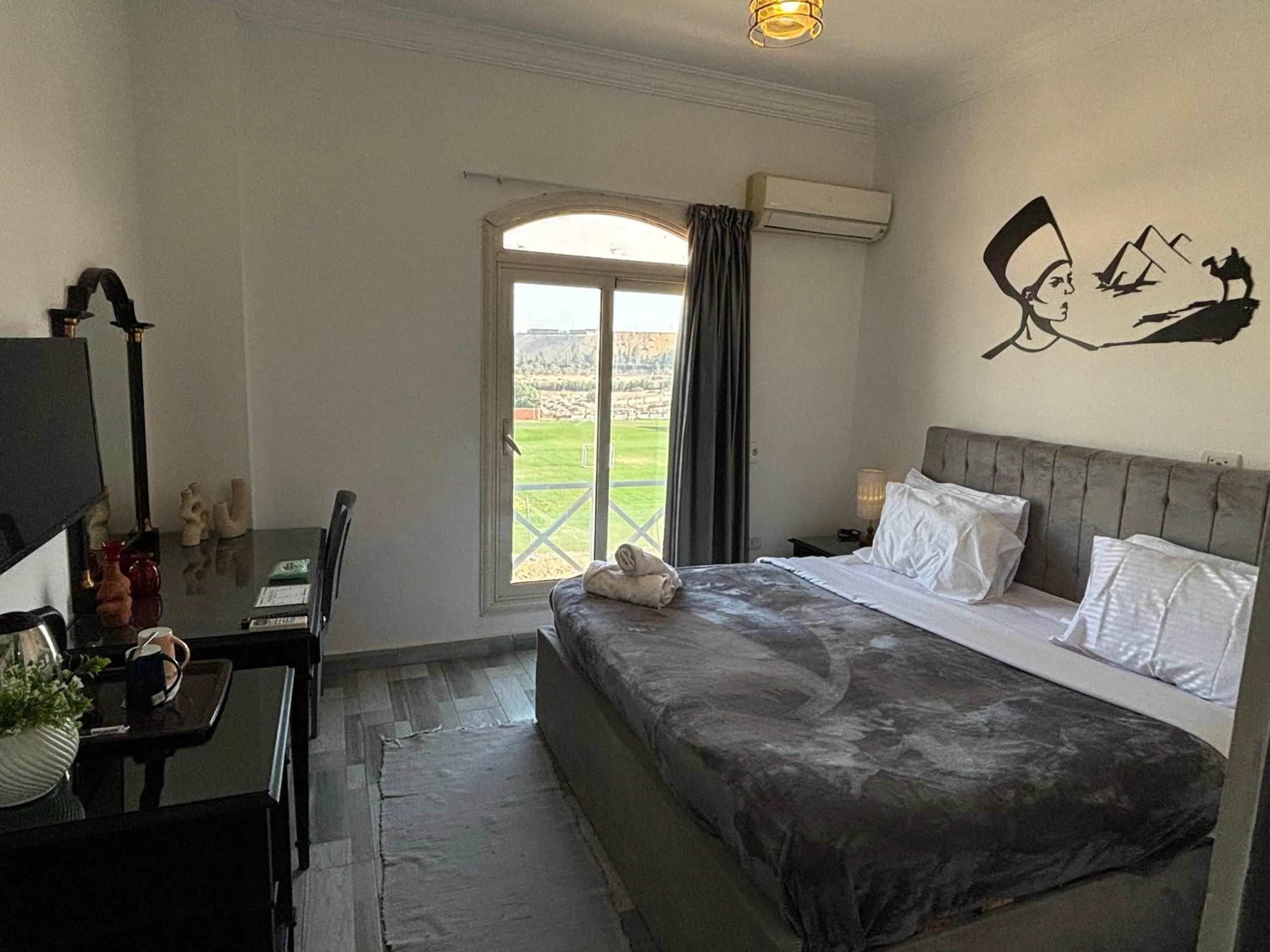 Bed in K Boutique Hotel MedSpa-Pyramids & Grand Egyptian Museum