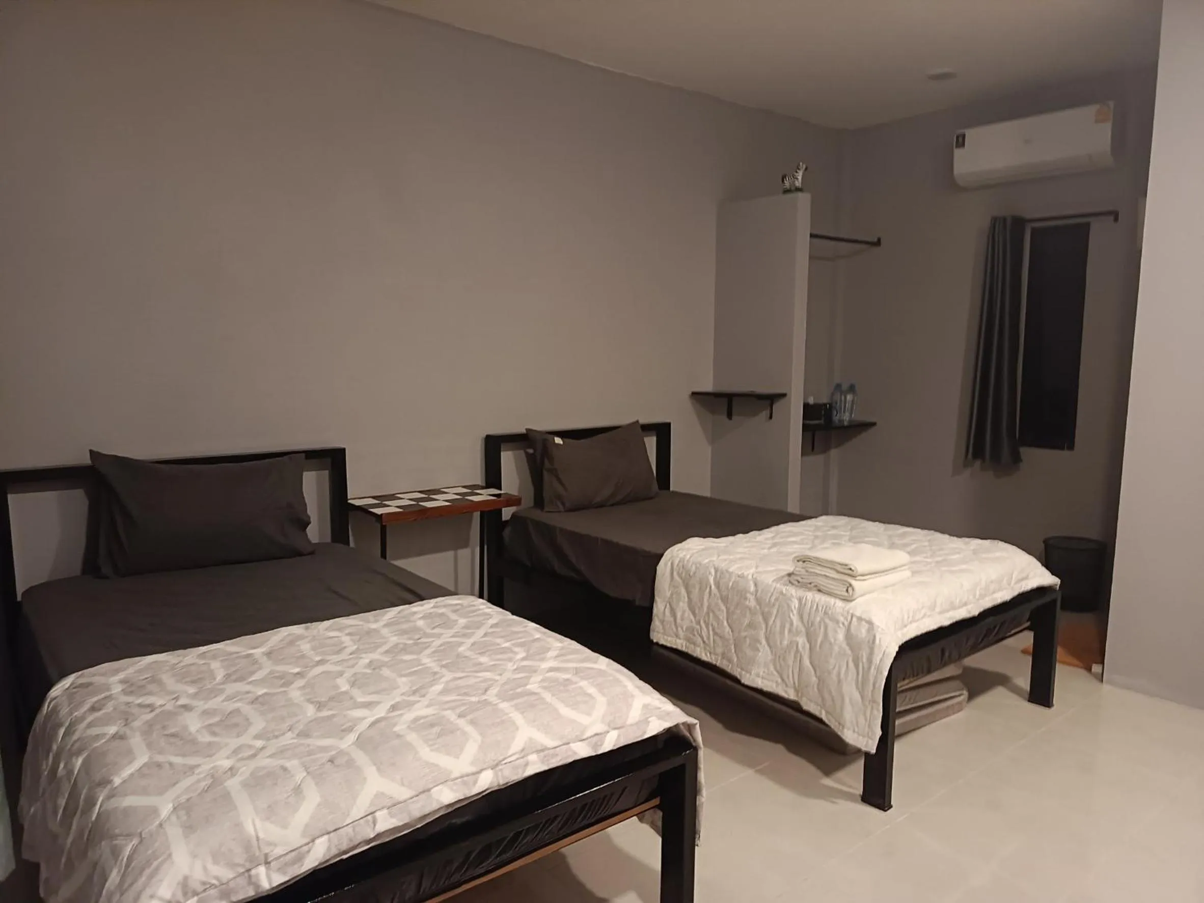 Bed in เช็คอินรีสอร์ท Check-in Resort