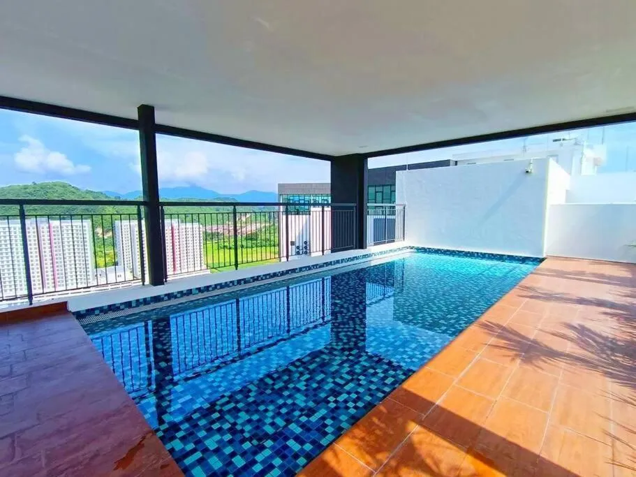 Swimming pool in The Horizon Ipoh Dual L13 by Grab A Stay