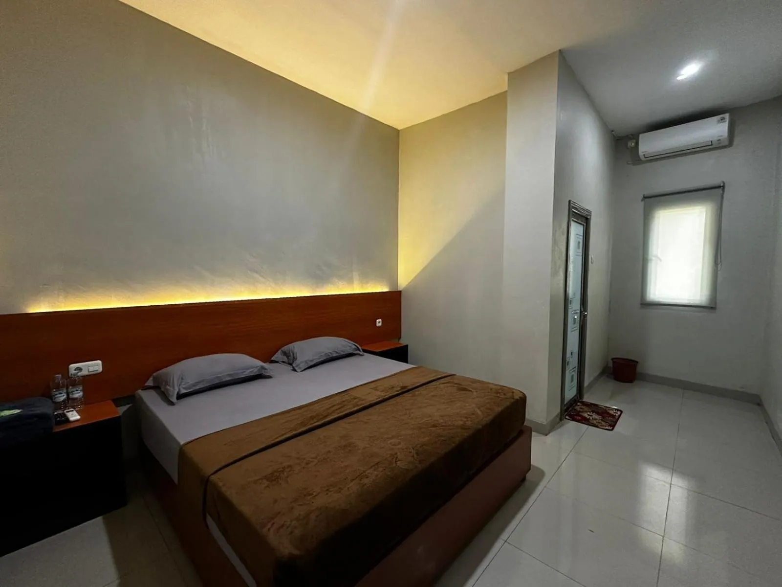 Bed in Grands Orchid Hotel