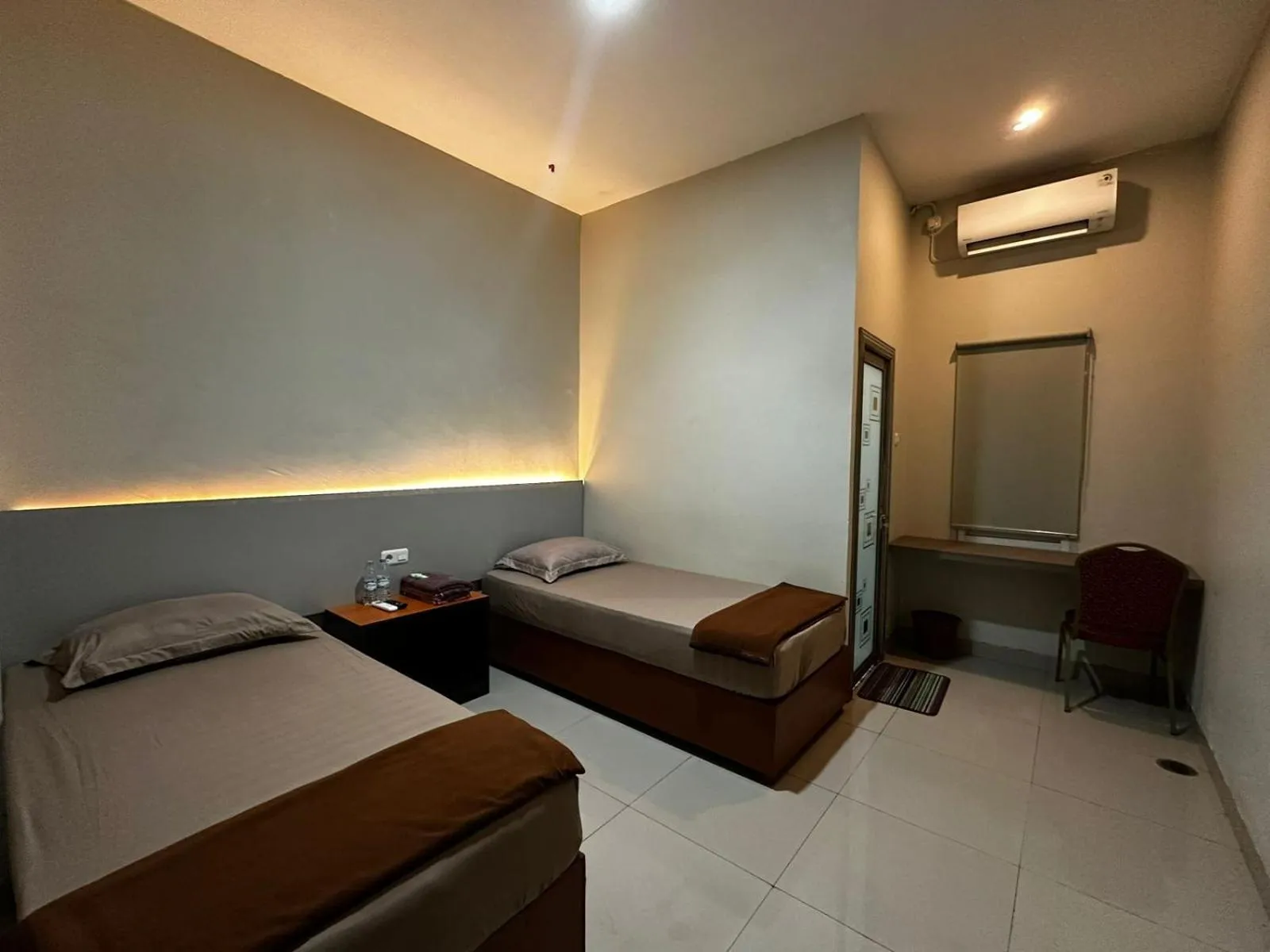 Bed in Grands Orchid Hotel