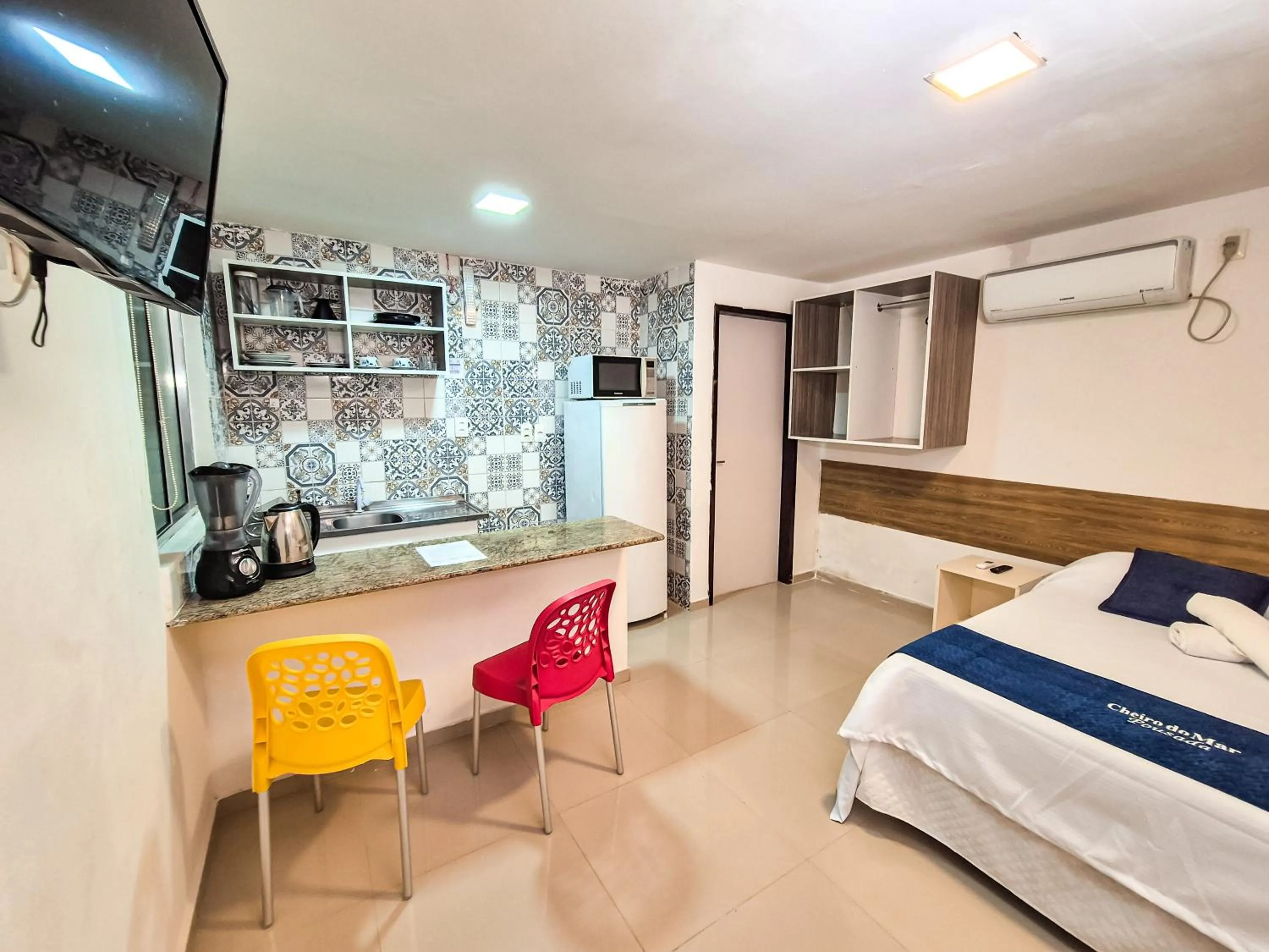 Bed in Pousada Cheiro do Mar