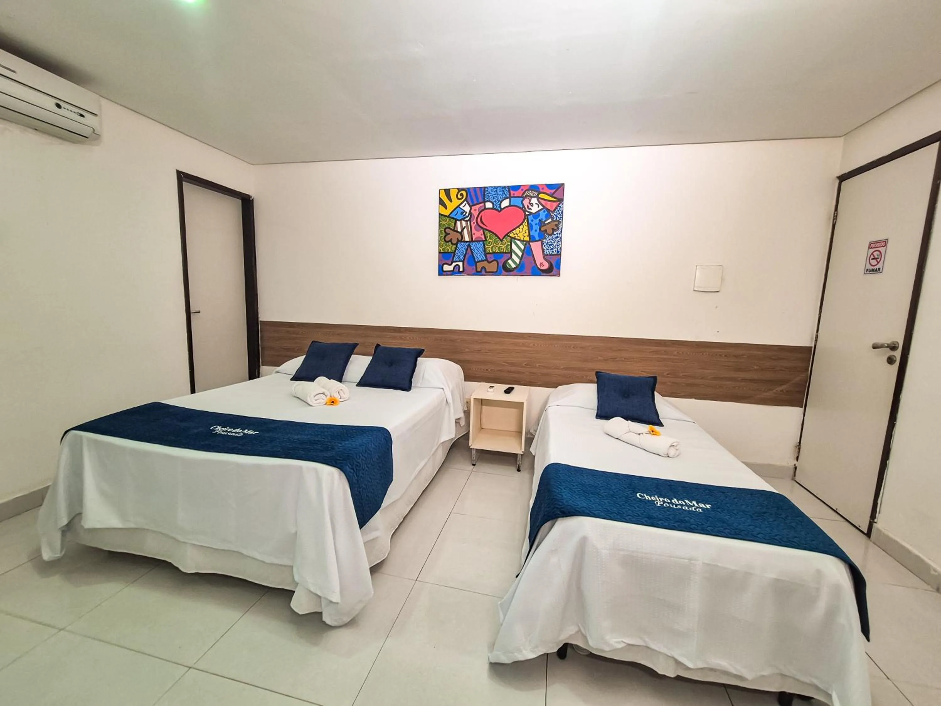 Bed in Pousada Cheiro do Mar