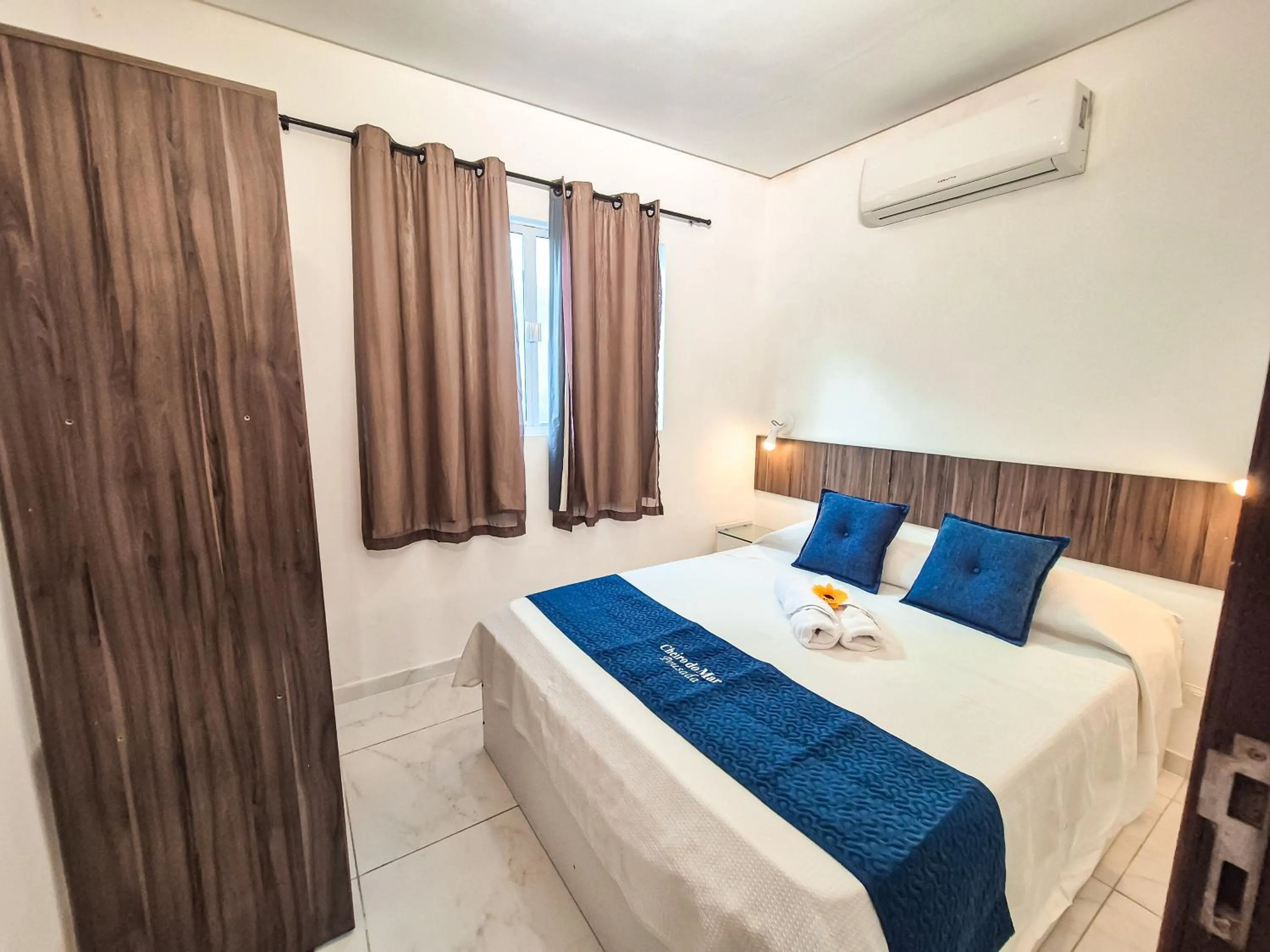 Bed in Pousada Cheiro do Mar