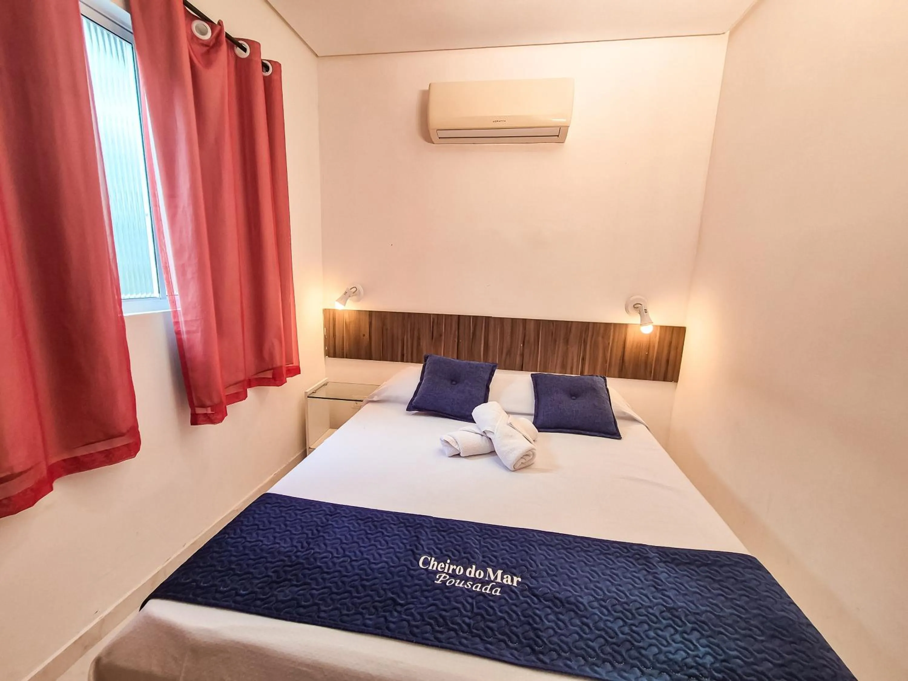 Bed in Pousada Cheiro do Mar