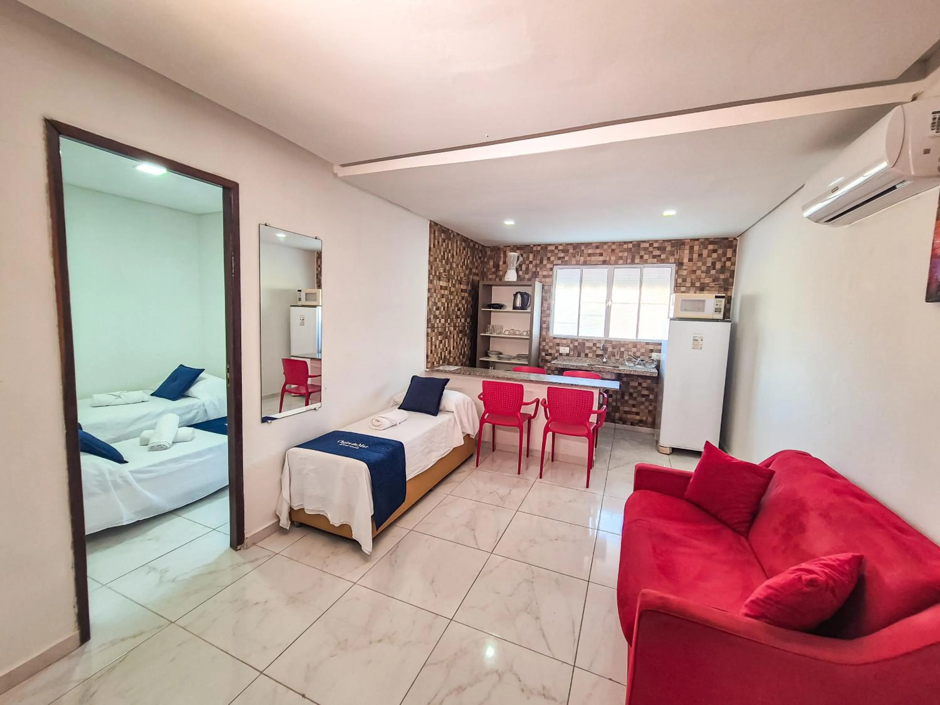 Bed in Pousada Cheiro do Mar