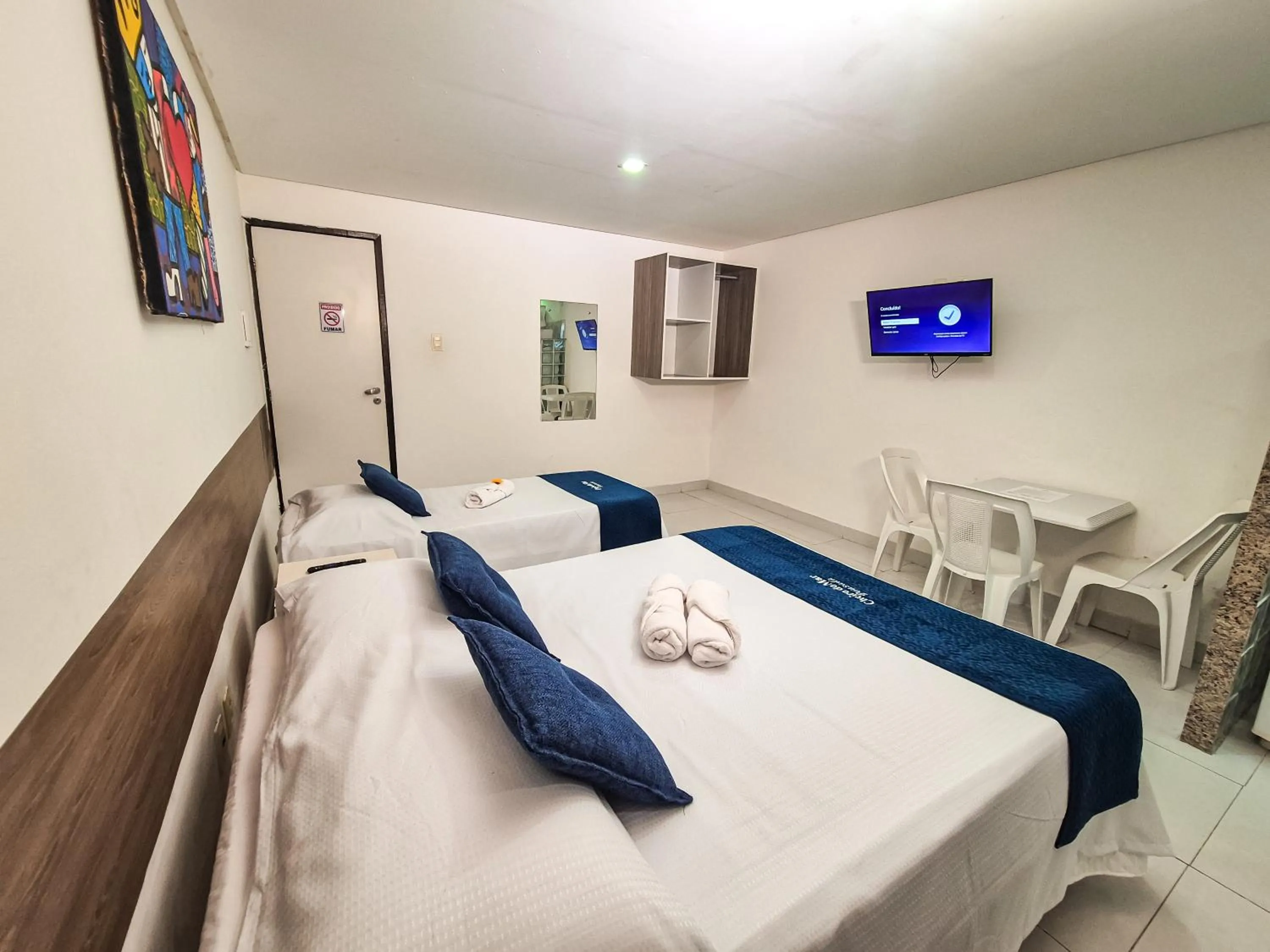 Bed in Pousada Cheiro do Mar