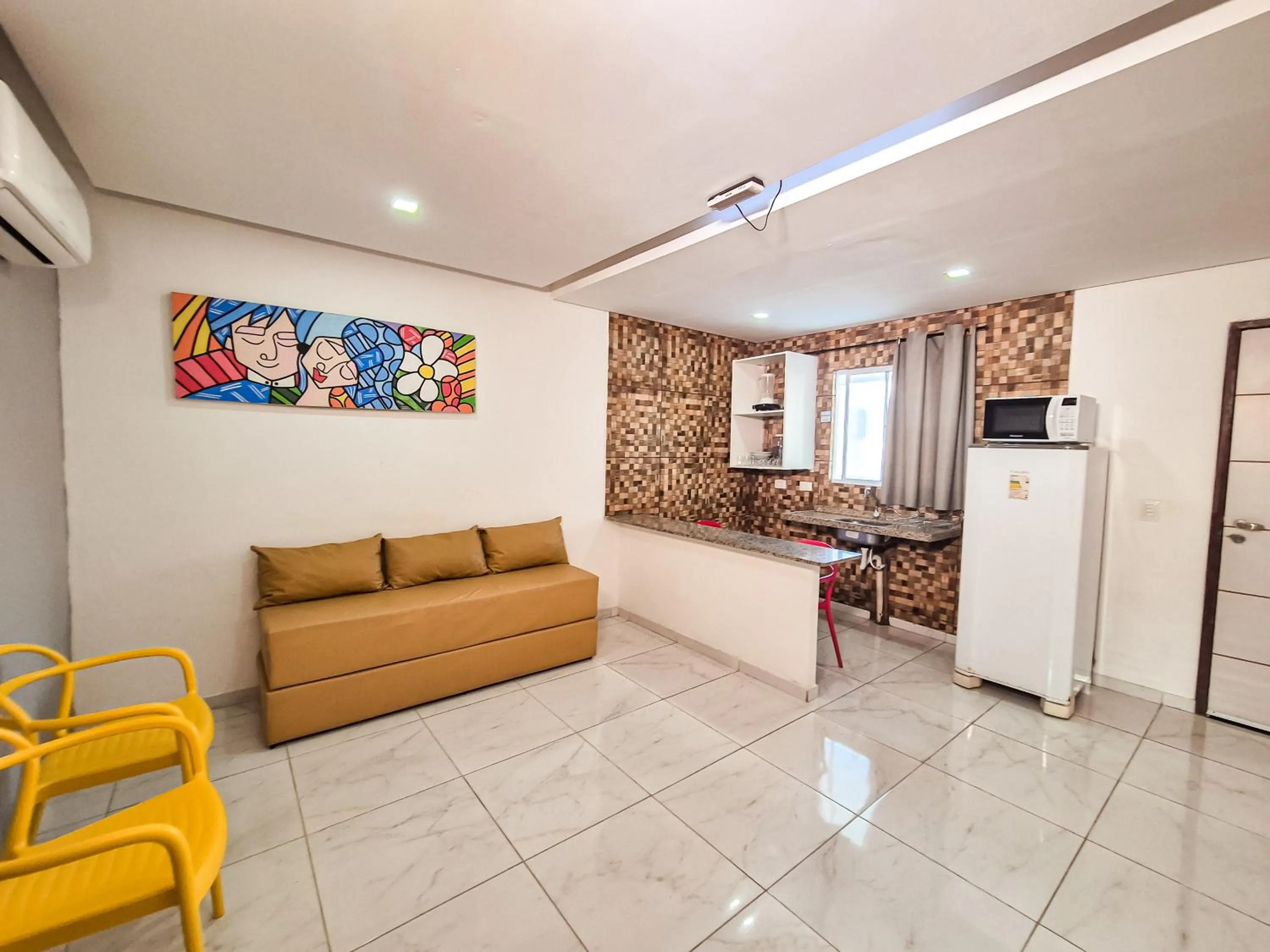 Kitchen or kitchenette in Pousada Cheiro do Mar