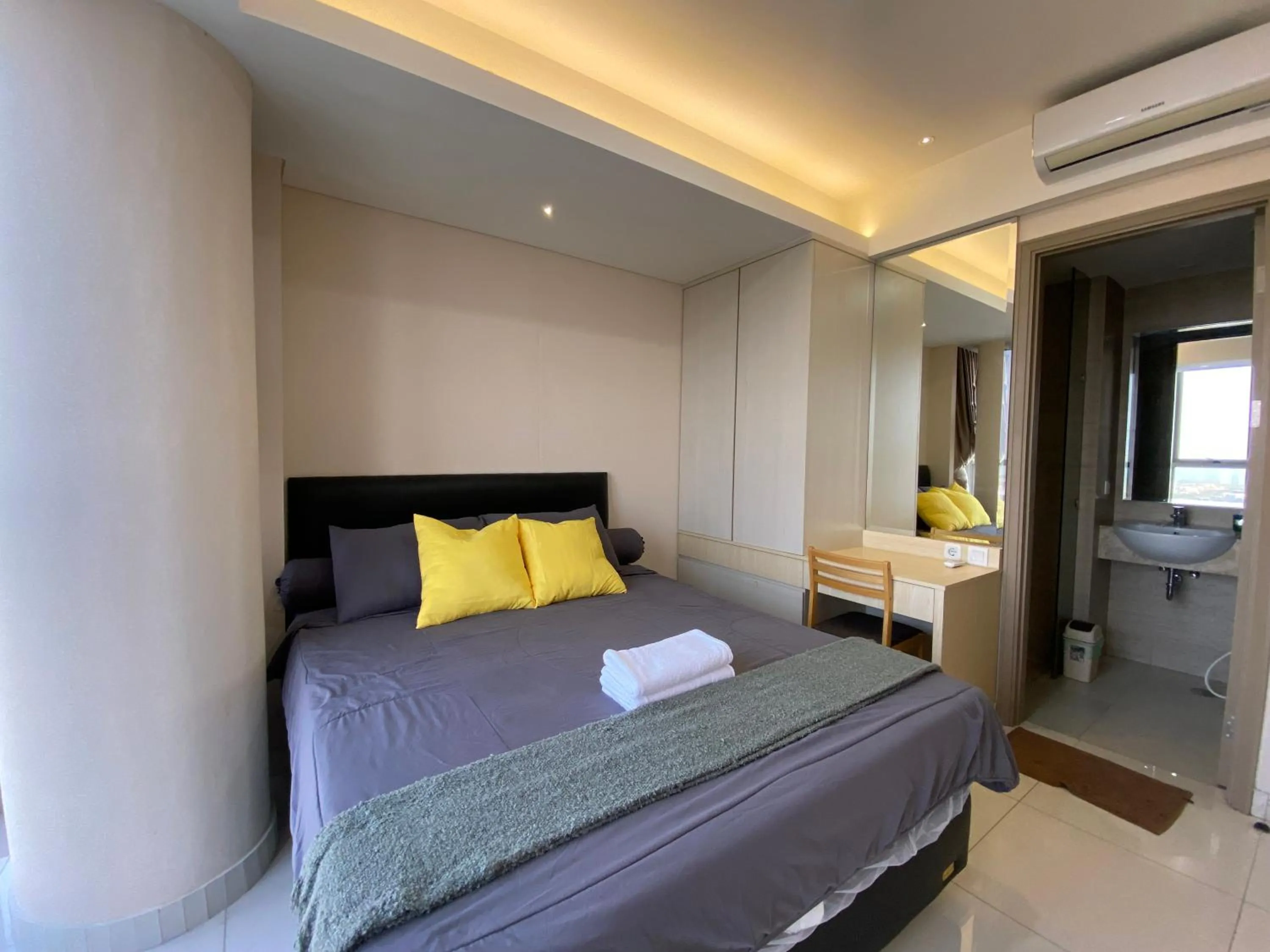 Bed in Comfort and Luxury Private Room at Goldcoast PIK