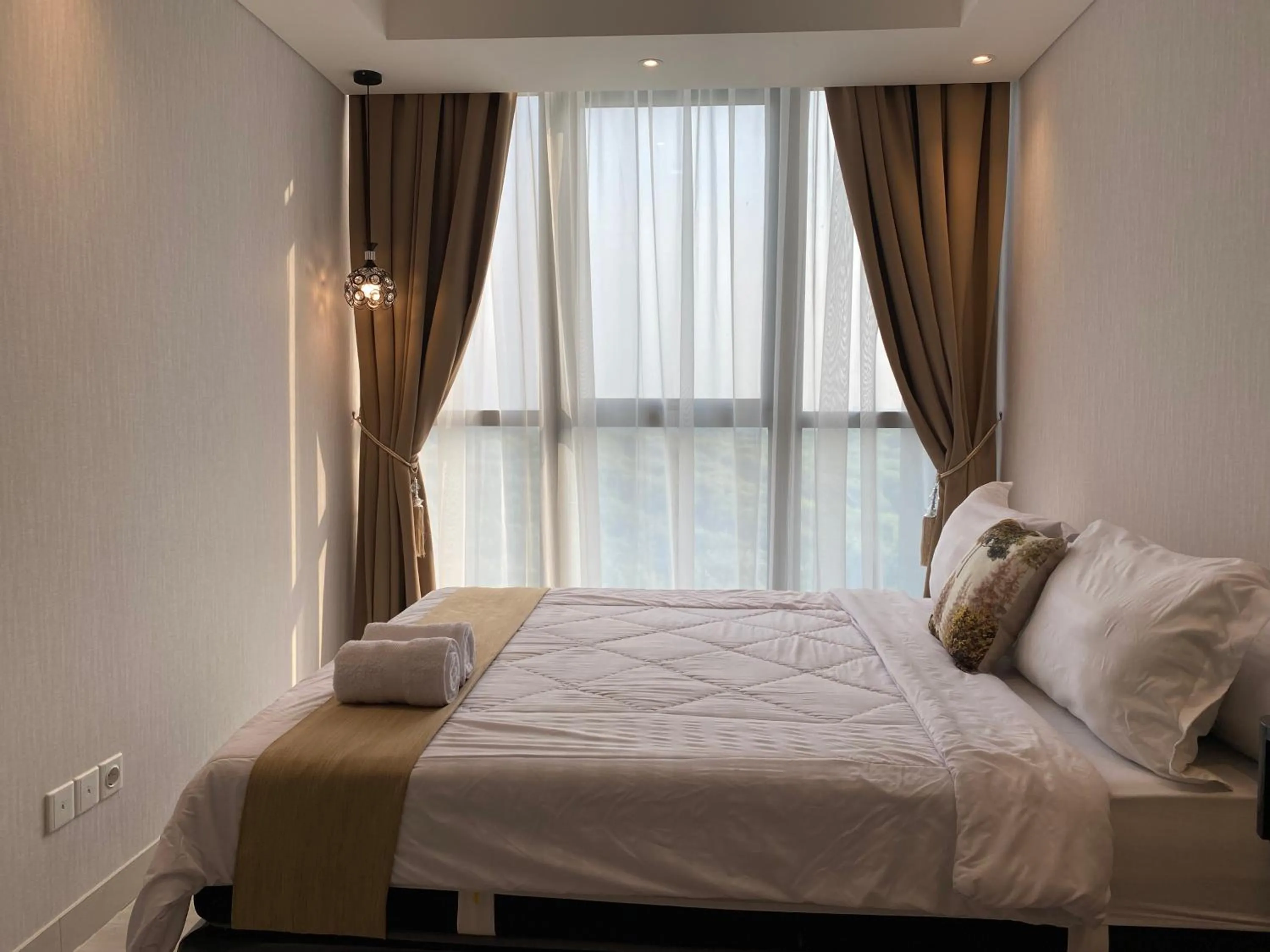 Two-Bedroom Apartment with Balcony and Terrace in Comfort and Luxury Private Room at Goldcoast PIK