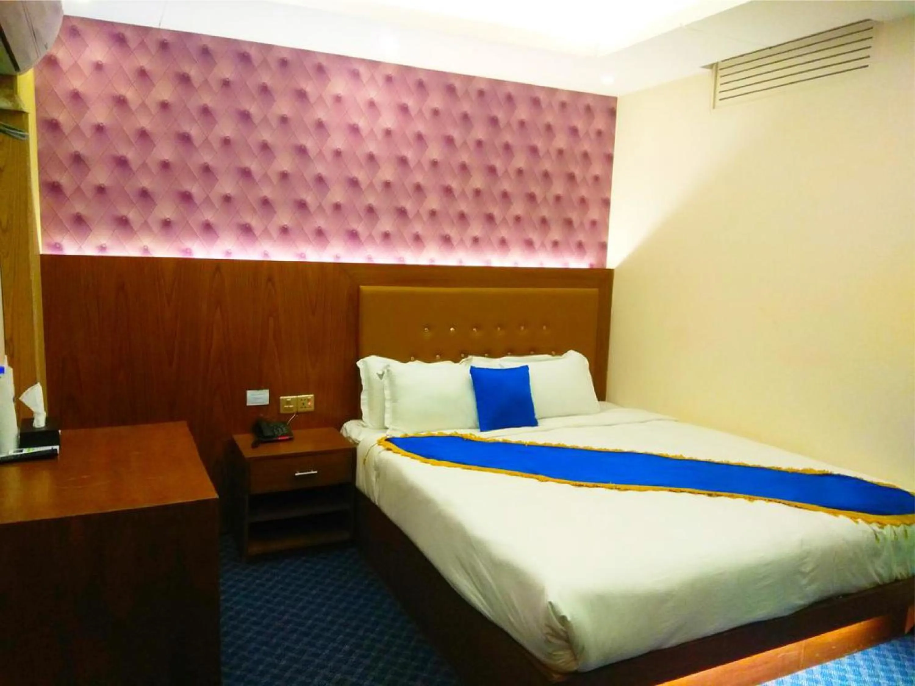 Bed in New Hotel Grand View