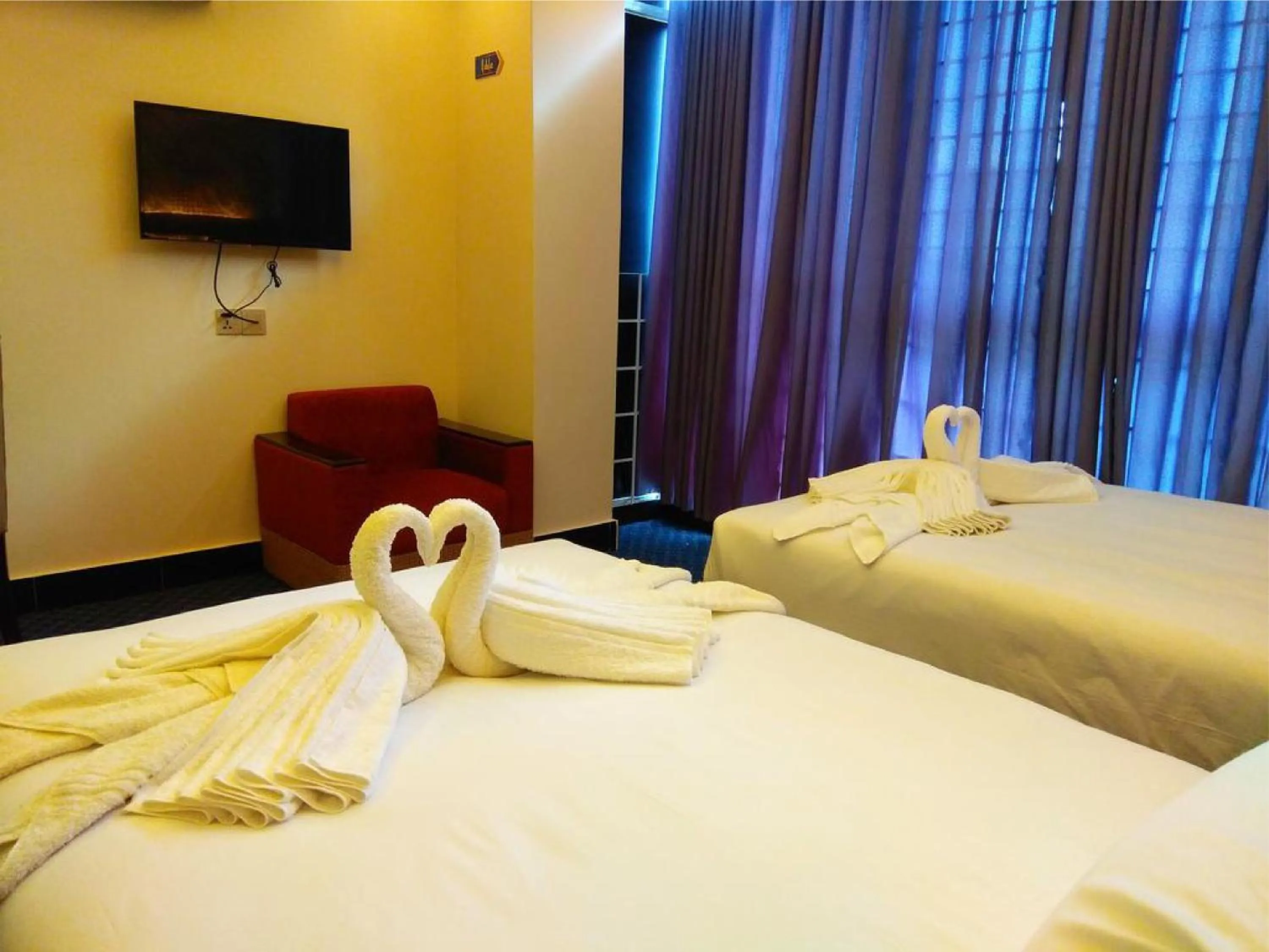 Bed in New Hotel Grand View