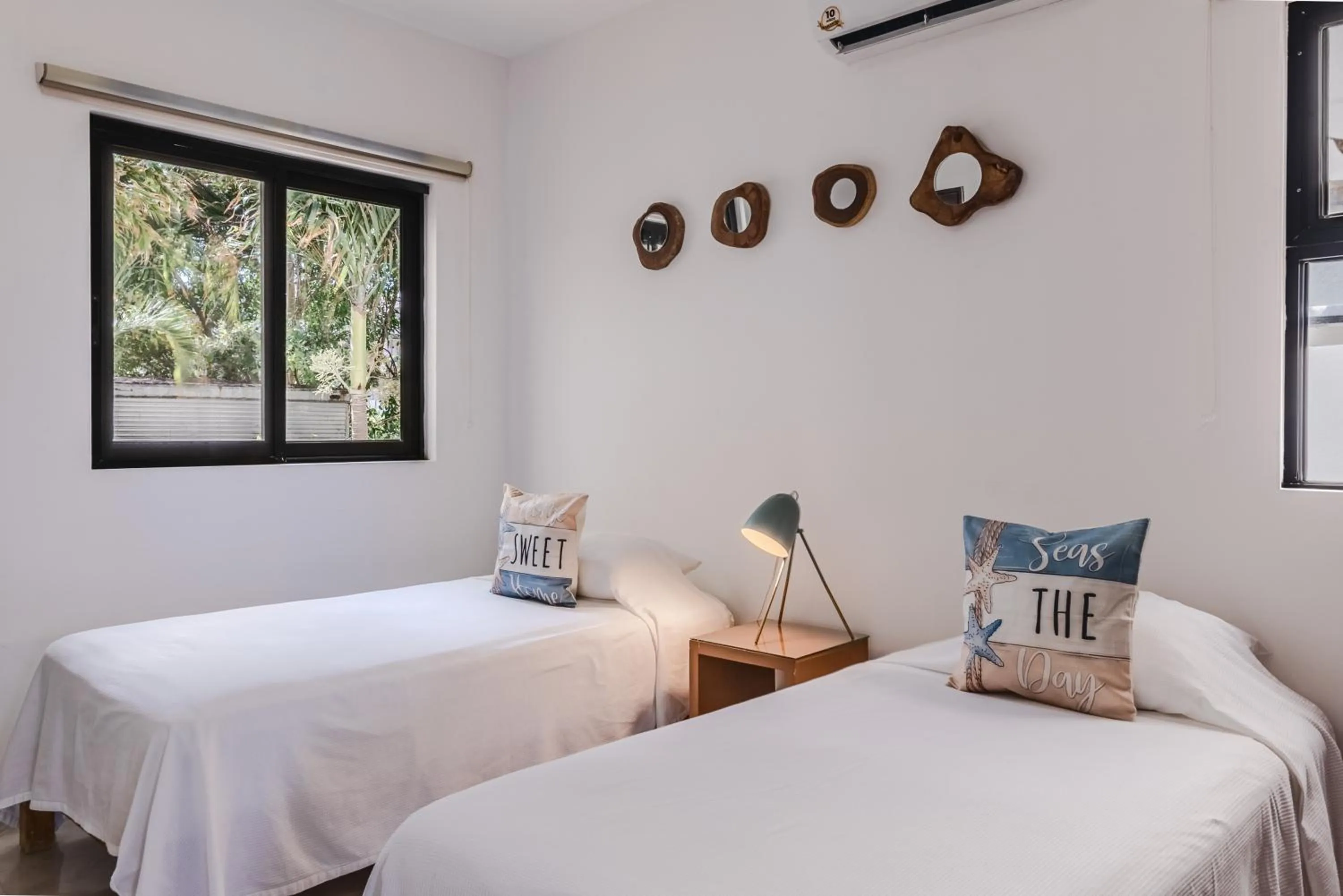 Bed in Vela's Condos Ocean Front