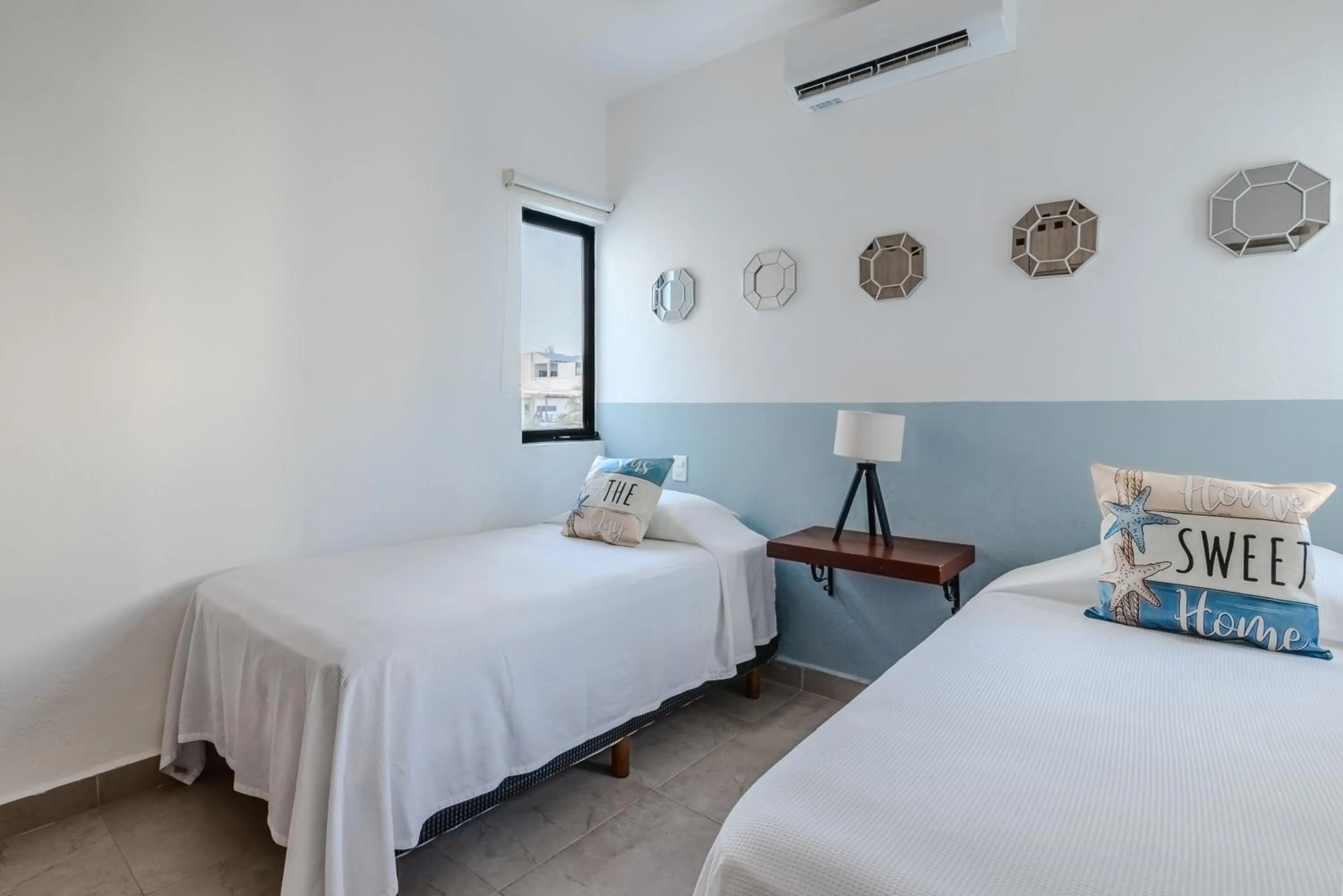 Bed in Vela's Condos Ocean Front